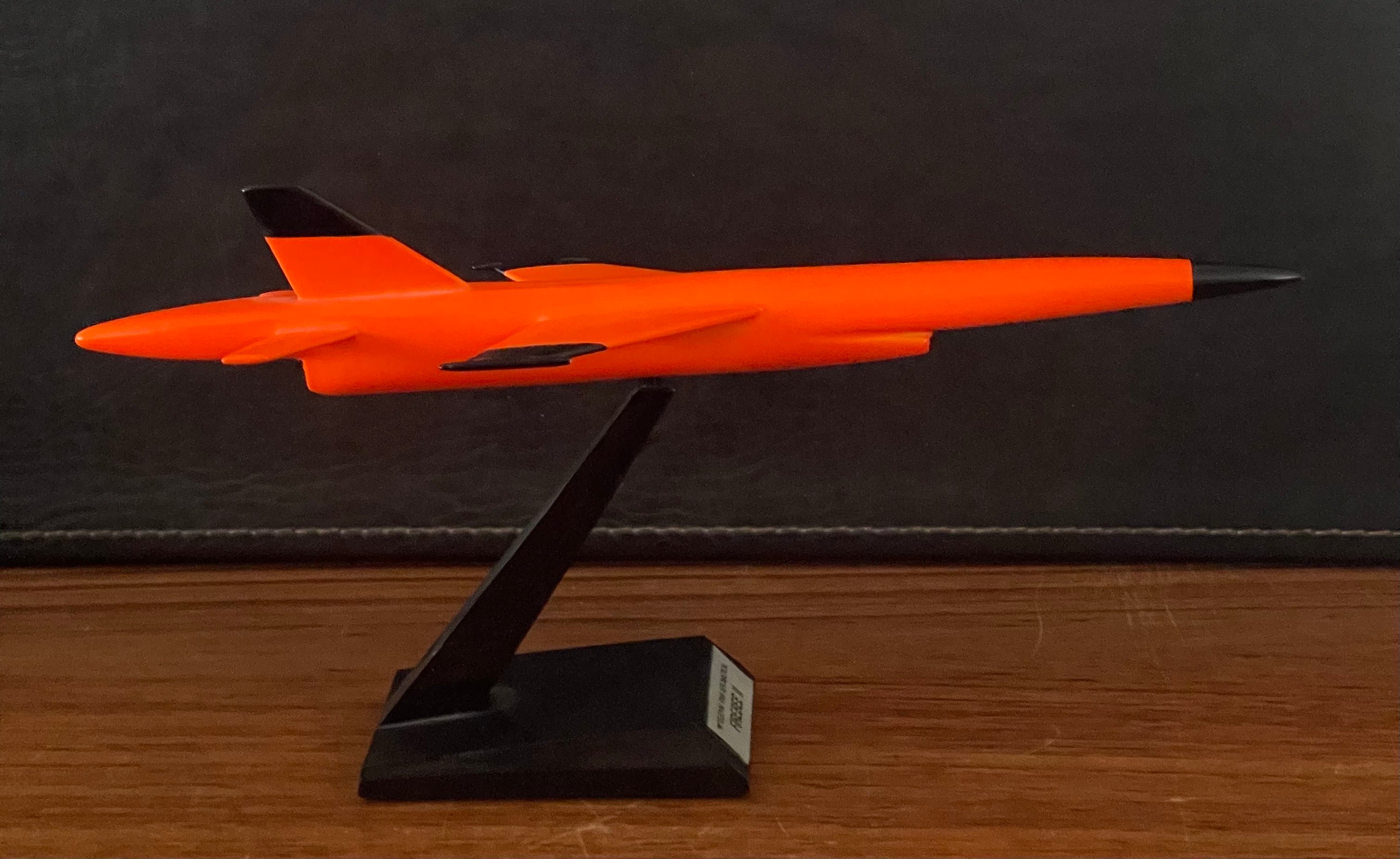 A very cool and extremely rare Teledyne Ryan Firebee II contractor's desk model, circa 1970s. The piece is in very good condition and super high quality. It is made of wood and mounted on a triangular plastic base; the desk model measures 3.75