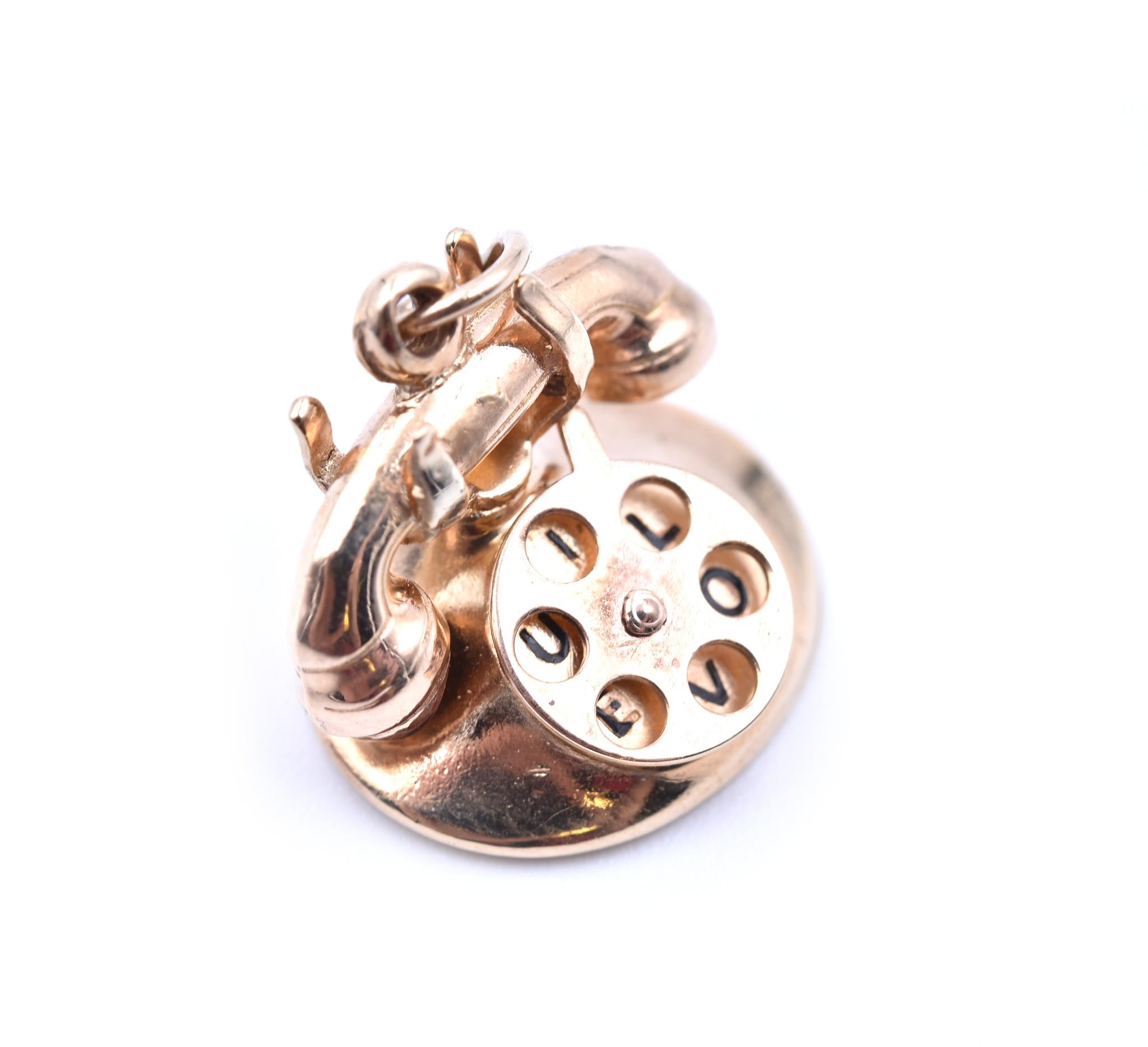 Designer: custom design
Material: 14k yellow gold
Dimensions: charm is 13mm long and 16mm wide
Weight: 3.03 grams
