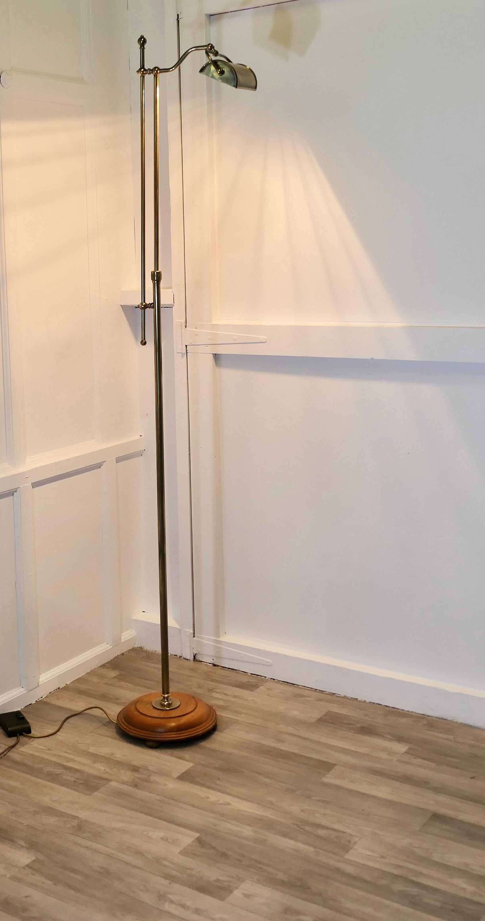Telescopic Brass Floor Standing Lamp Swivel Angle Reading Lamp

This charming floor Standing Study lamp, can be raised and lowered, it can be angled and swivelled for best advantage
The lamp base is made in golden beech, the telescopic cooling and