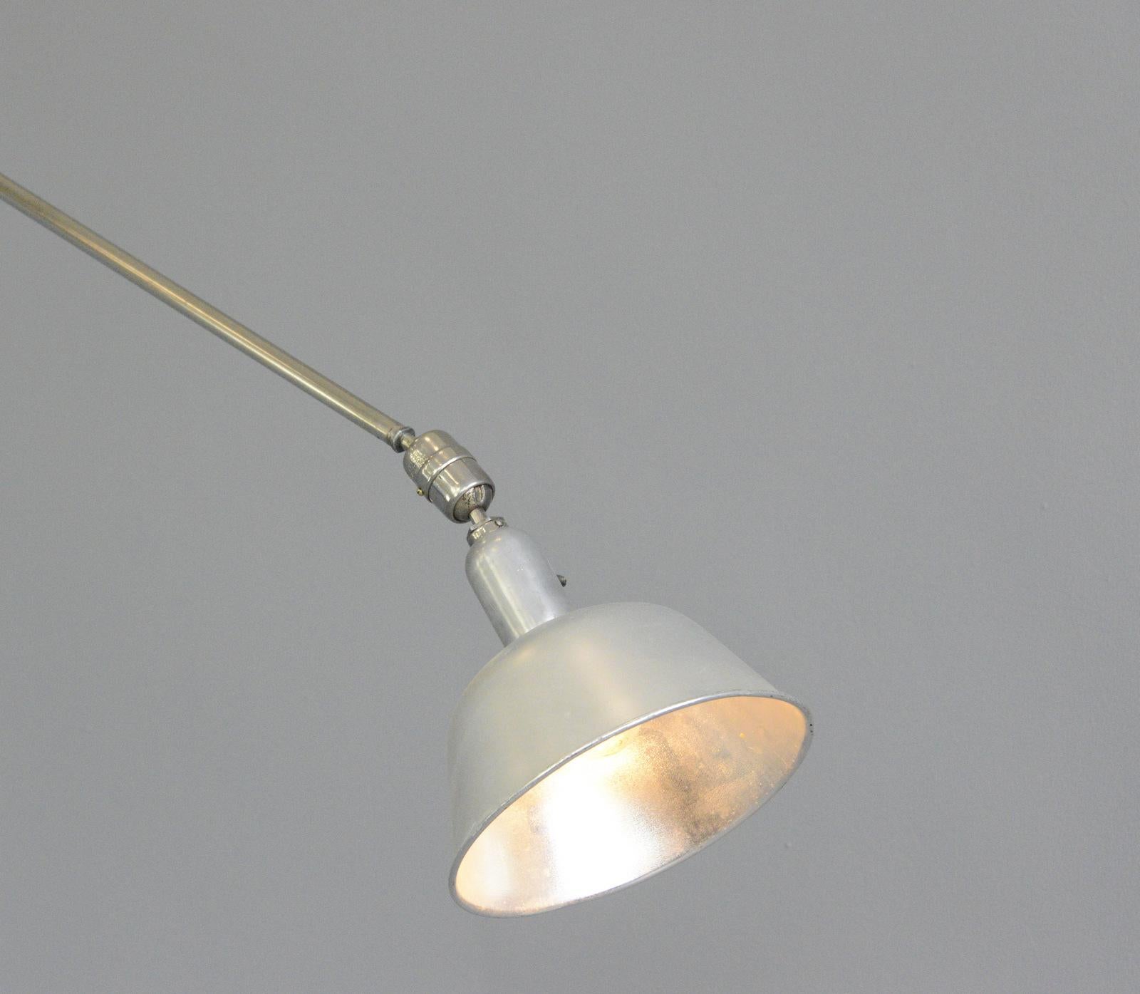 Telescopic task lamp by Johan Petter Johansson for Triplex, 1920s

- Aluminium shade
- Telescopic arms
- The shade detaches from the arm to create a pendant
- Brushed steel
- Original On/Off toggle switch on the shade
- Made by ASEA under the