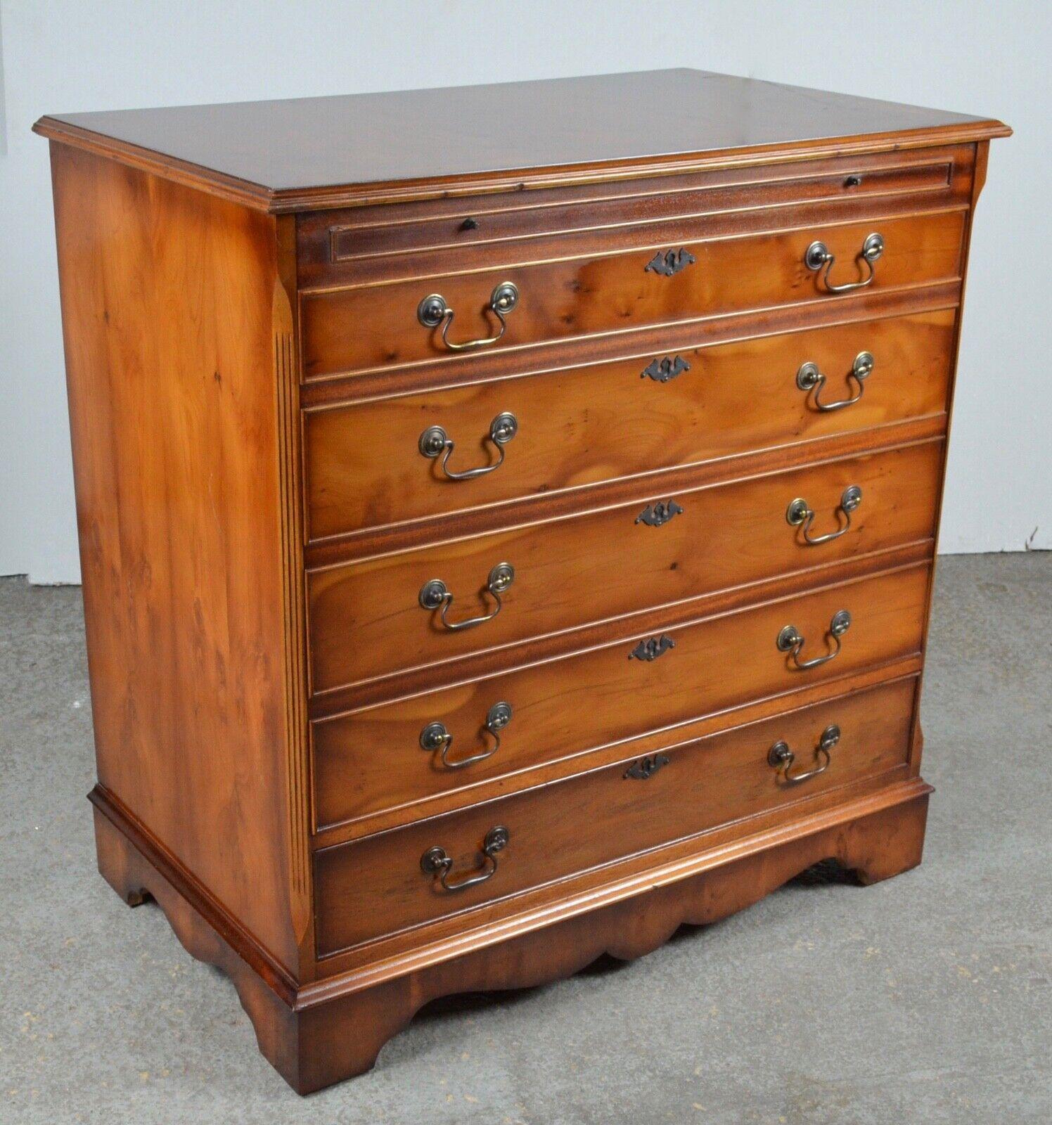 We are delighted to offer for sale this lovely stunning inlaid TV storage cupboard in the style of a Georgian figured walnut and boxwood inlaid chest of drawers, nicely antiqued with boxwood star inlay and solid brass handles and