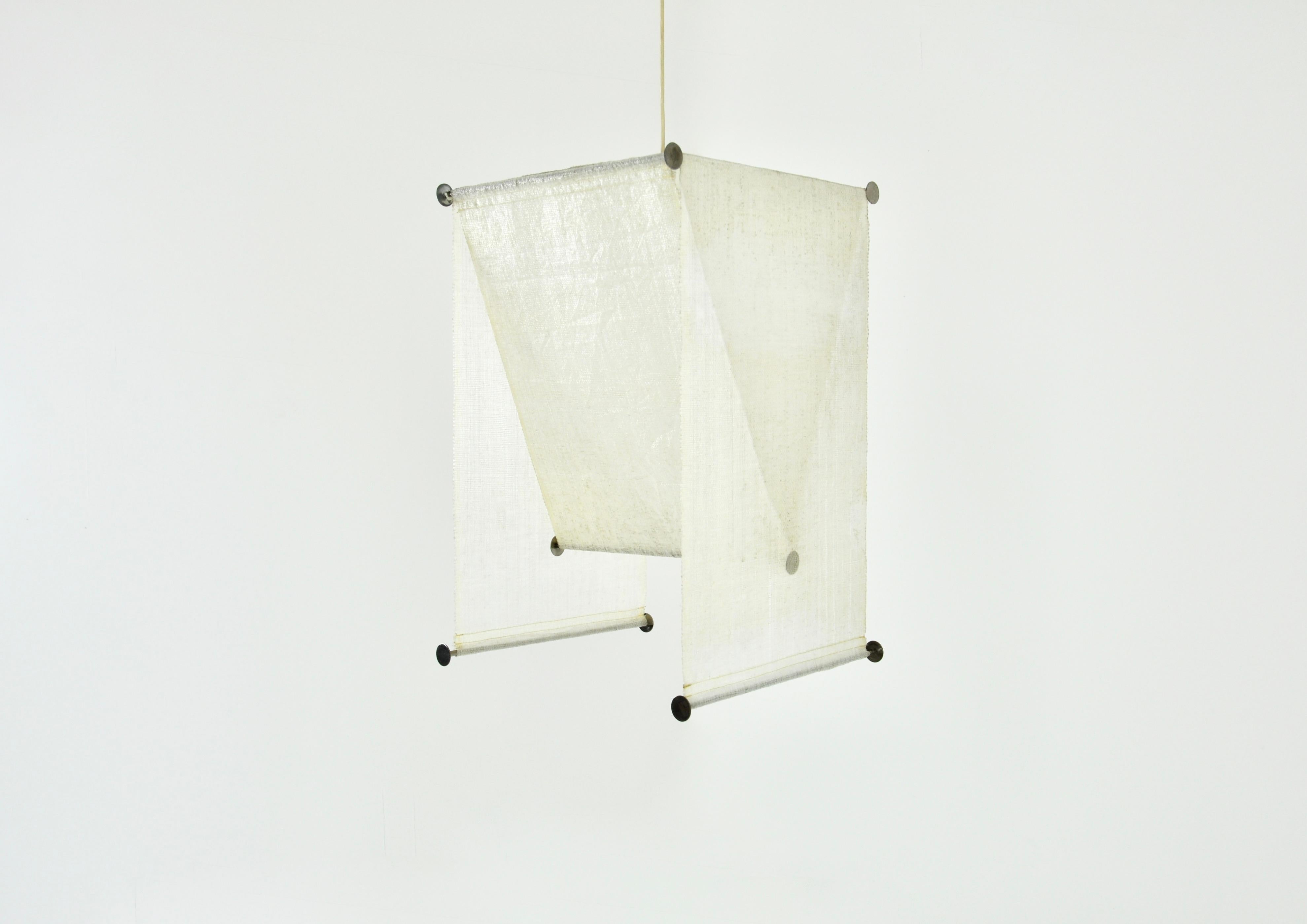 Hanging lamp in fabric and metal. Model: 