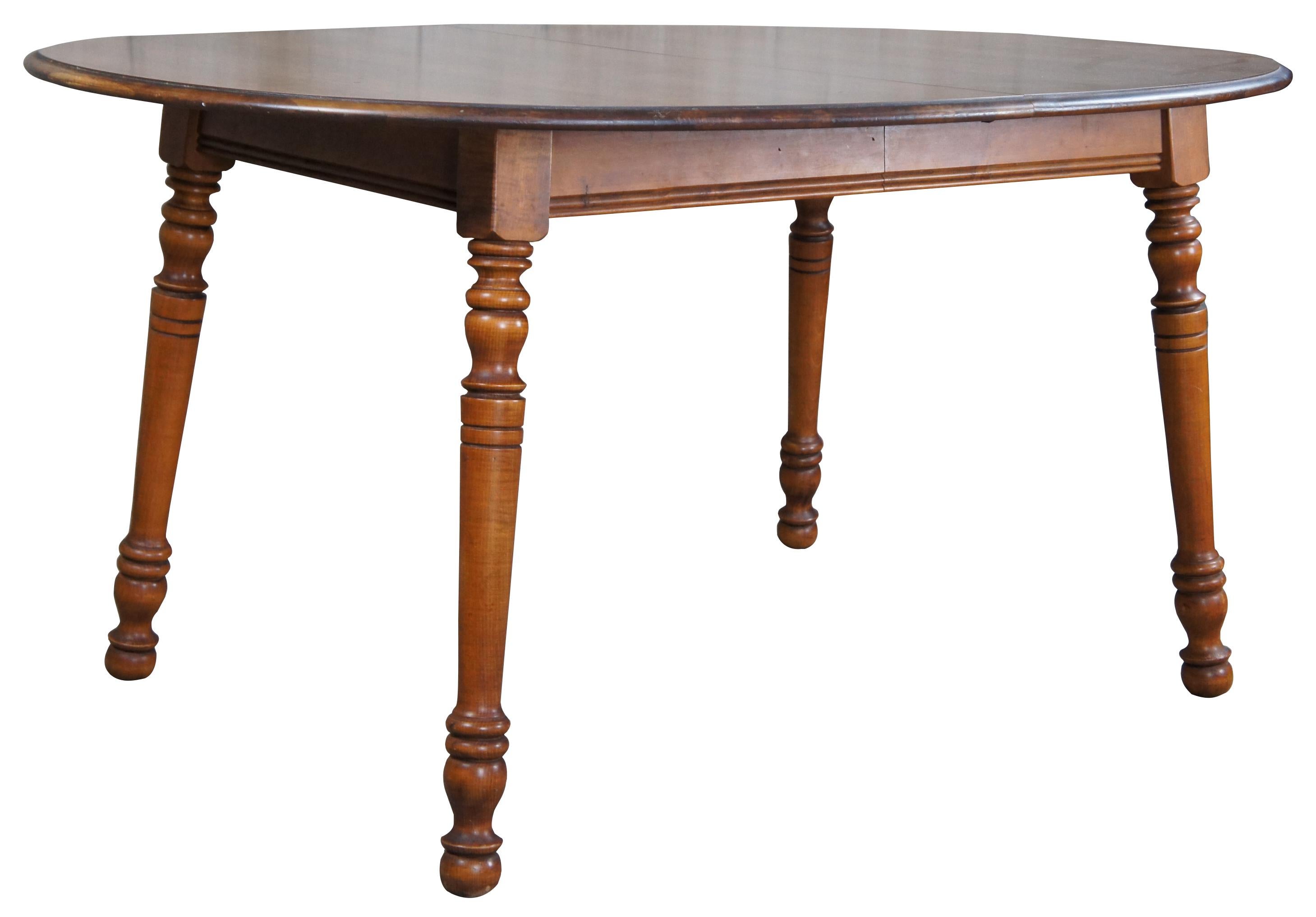 Tell City Chair Company hard rock maple dining table, circa 1960s. Features an oval form with colonial styling and two leaves for extension.

The Tell City Furniture Company, also known as the Tell City Chair company, was one of the most