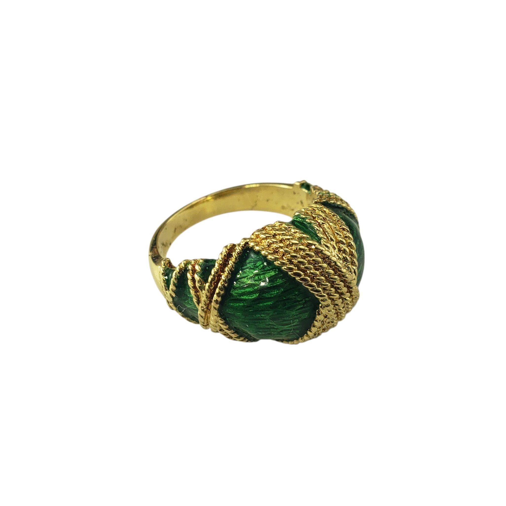 Tellem & Co. 18 Karat Yellow Gold Green Enamel Dome Ring Size 6-

Vintage Tellem & Co. craftsmanship shines in this bold dome ring, crafted in rich 18K yellow gold. The design features a vibrant green guilloche enamel, accented with textured gold