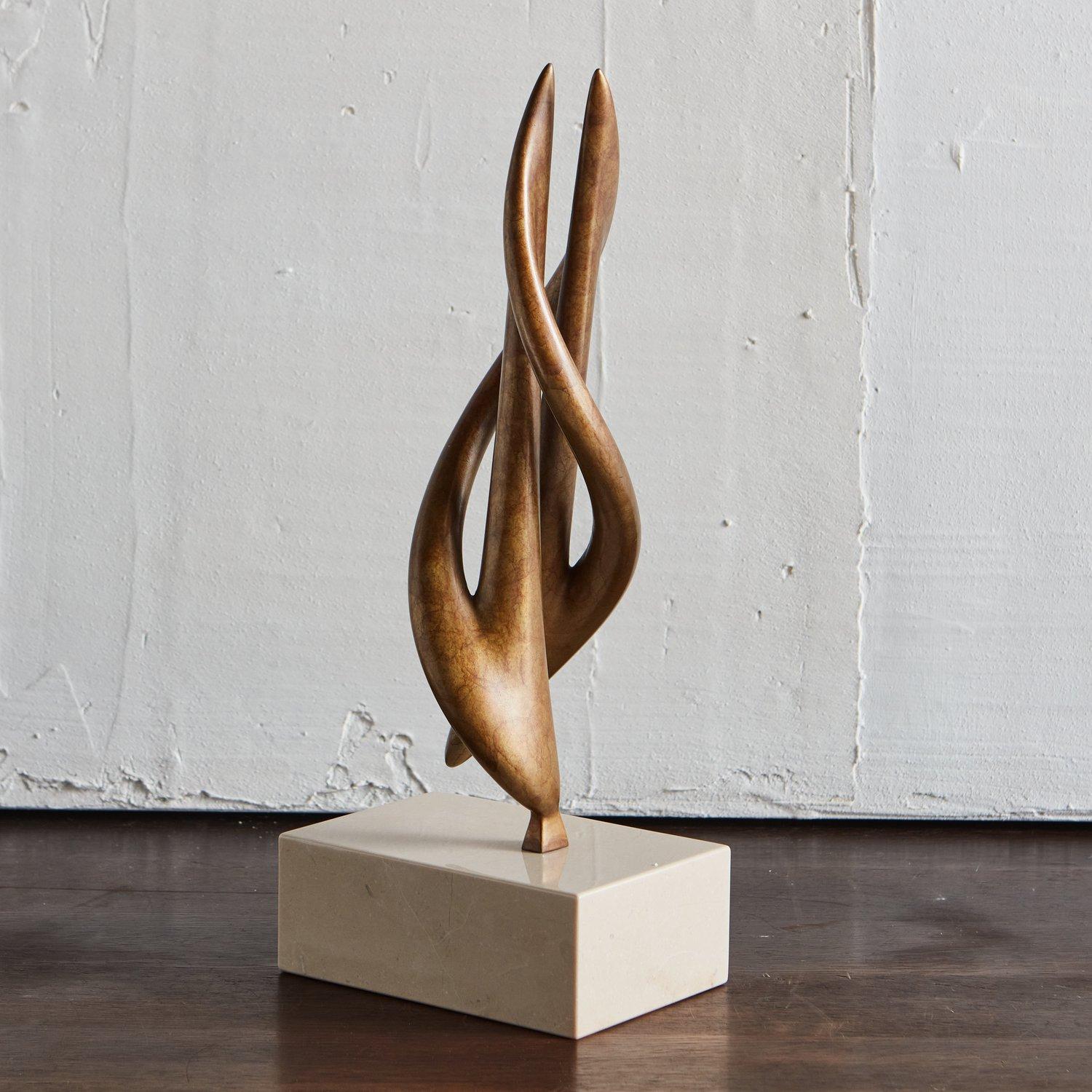 The Telomere Twist Taper sculpture by Chicago artist Karl Geckler. Featured here in an Antique Bronze Finish and mounted on a polished cream marble base.

This piece is available standard in a Satin Bronze Finish for $3,120, with a Polished Black