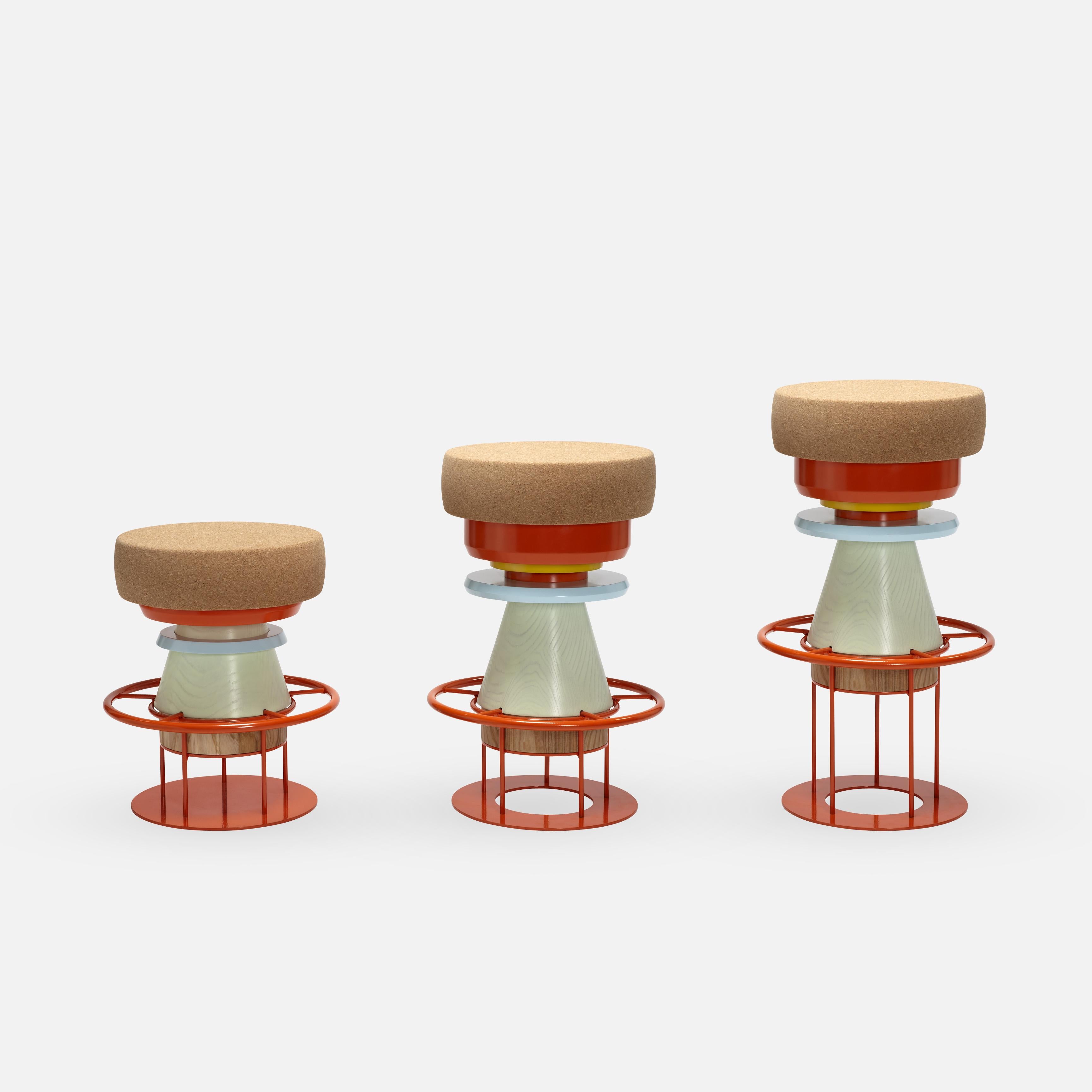 Tembo is a sculptural stool that combines a wood metal body with a solid cork seat. The designers drew their inspiration both from the African tam-tams -Tembo means elephant coot in swahili- and give a nod to the Memphis Group of the 80s