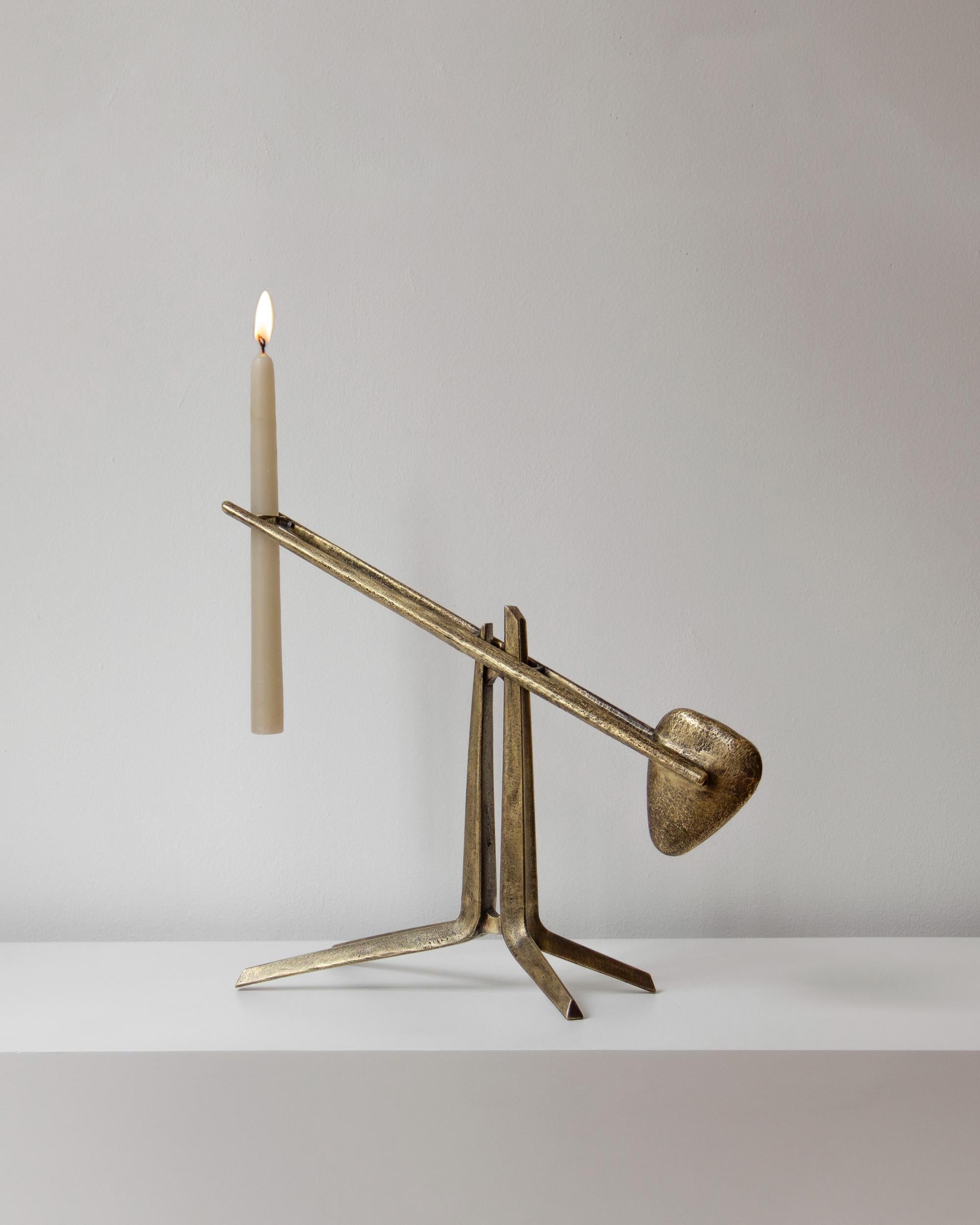 Temis Candle Holder by Federico Stefanovich
Dimensions: D 12 x W 40 x H 32 cm
Material: Bronze

Temis is a re-edited piece sand casted in solid bronze. It is then welded, ground
and brushed to highlight the imperfections of the process itself. As a