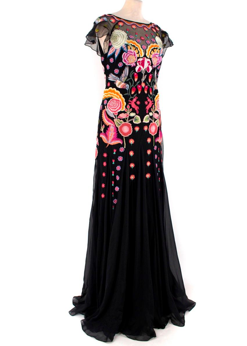 Temperley Chimera Black-Embroidered Gown

-Black tulle gown
-Bright floral embroidery
-Sheer dress with black lining
-Back zip closure
-Boat neckline
-Tailored around the bust

Please note, these items are pre-owned and may show signs of being