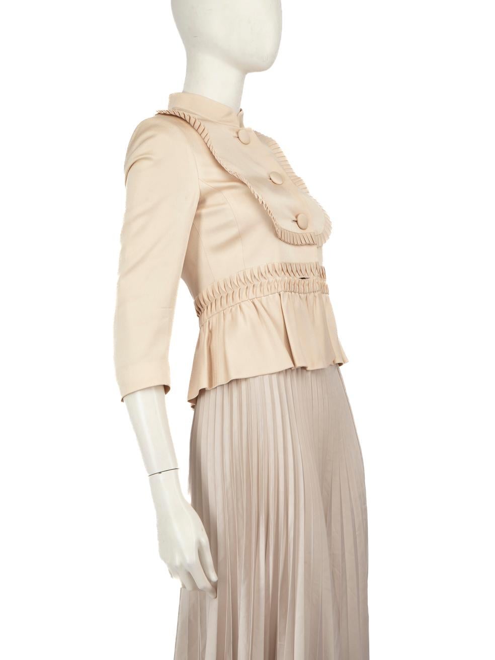 CONDITION is Good. General wear to jacket is evident. Moderate signs of wear with discolouration on the front, sleeves, back, and back of the neck collar, as well as discolouration on the inside lining. The bottom button on the centre front is