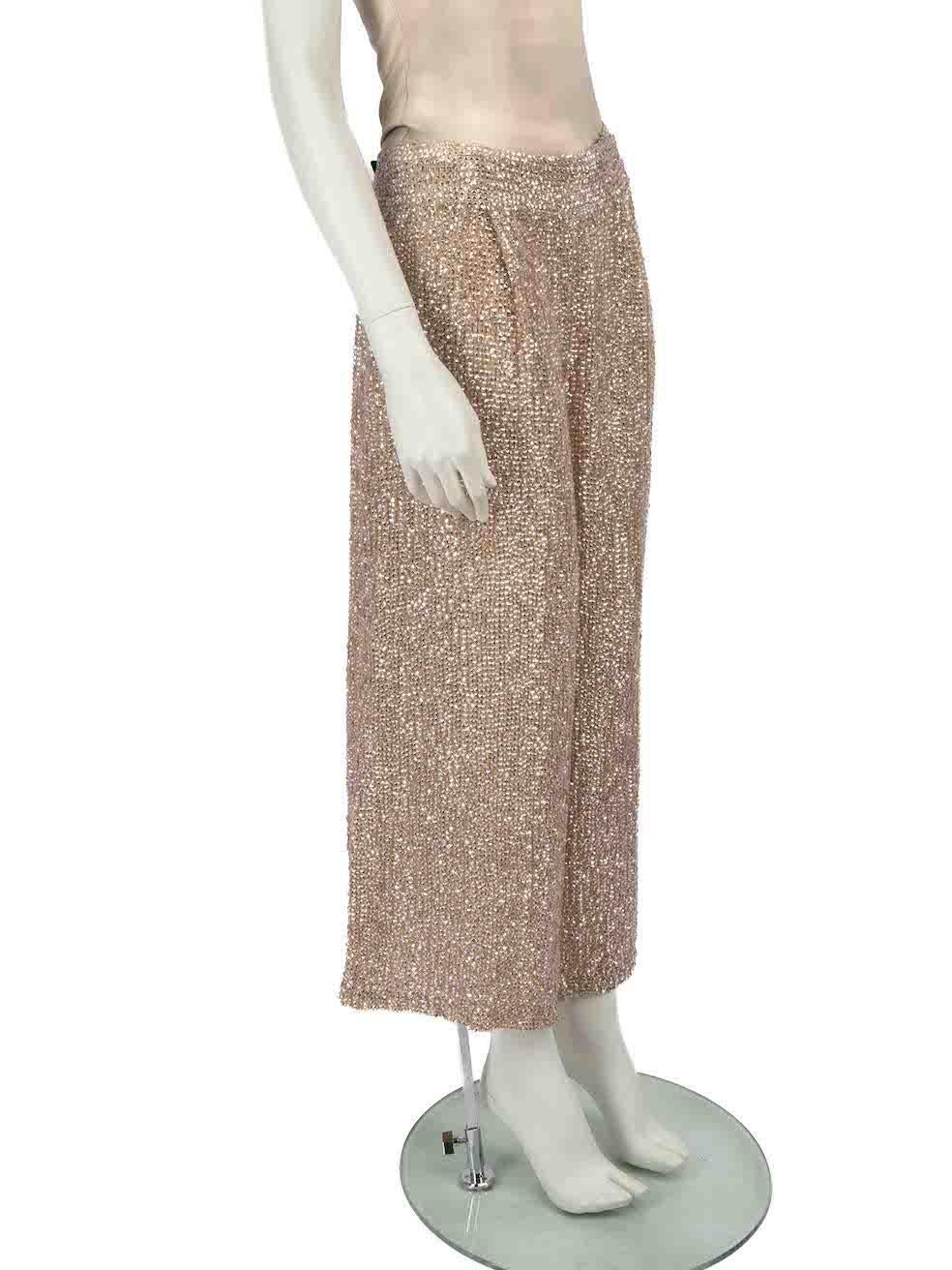 CONDITION is Very good. Minimal wear to trousers is evident. Minimal wear to the lining with slight discolouration at the waistband on this used Temperley London designer resale item.
 
 
 
 Details
 
 
 Beige
 
 Viscose
 
 Trousers
 
 Sequinned
 
