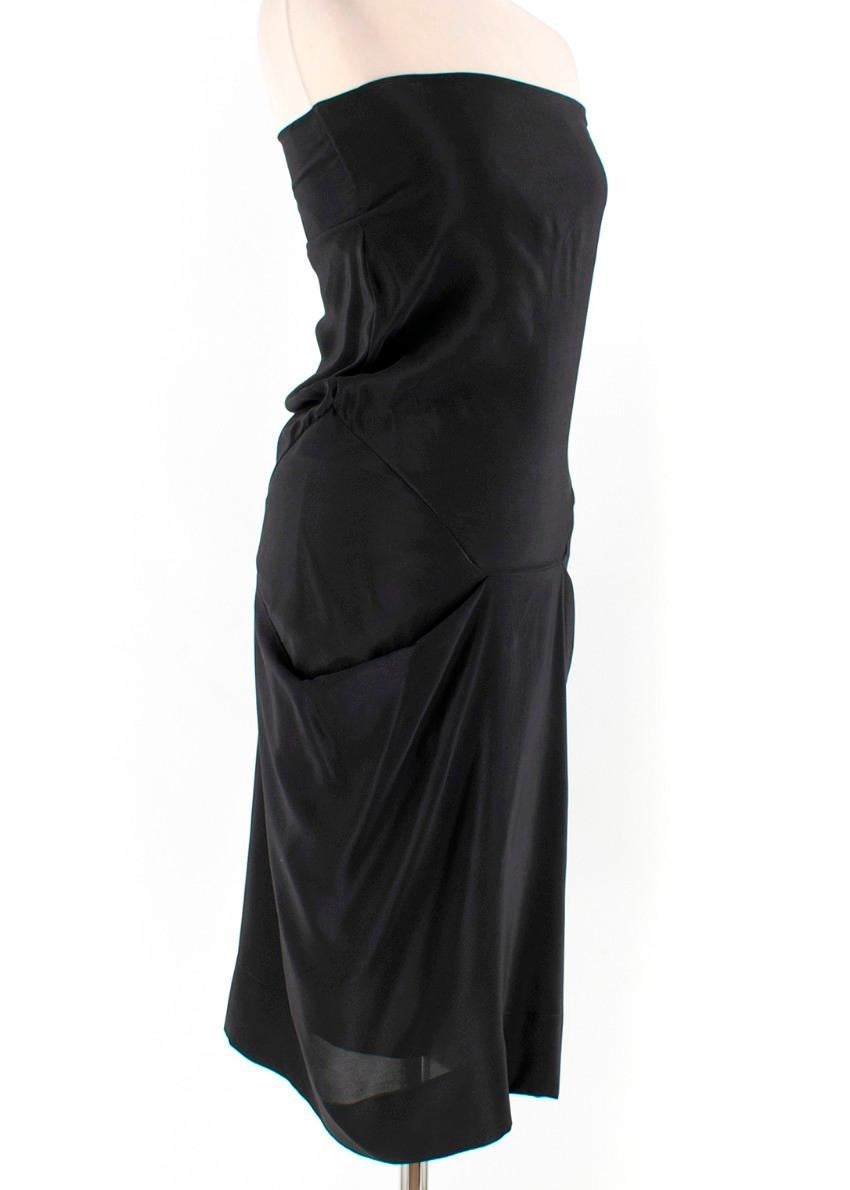 Vivienne Westwood Strapless Black Draped Dress

-Black silk strapless dress
-Draped dress with detailing at the waist
-Side zip closure
-Mini dress

Please note, these items are pre-owned and may show signs of being stored even when unworn and