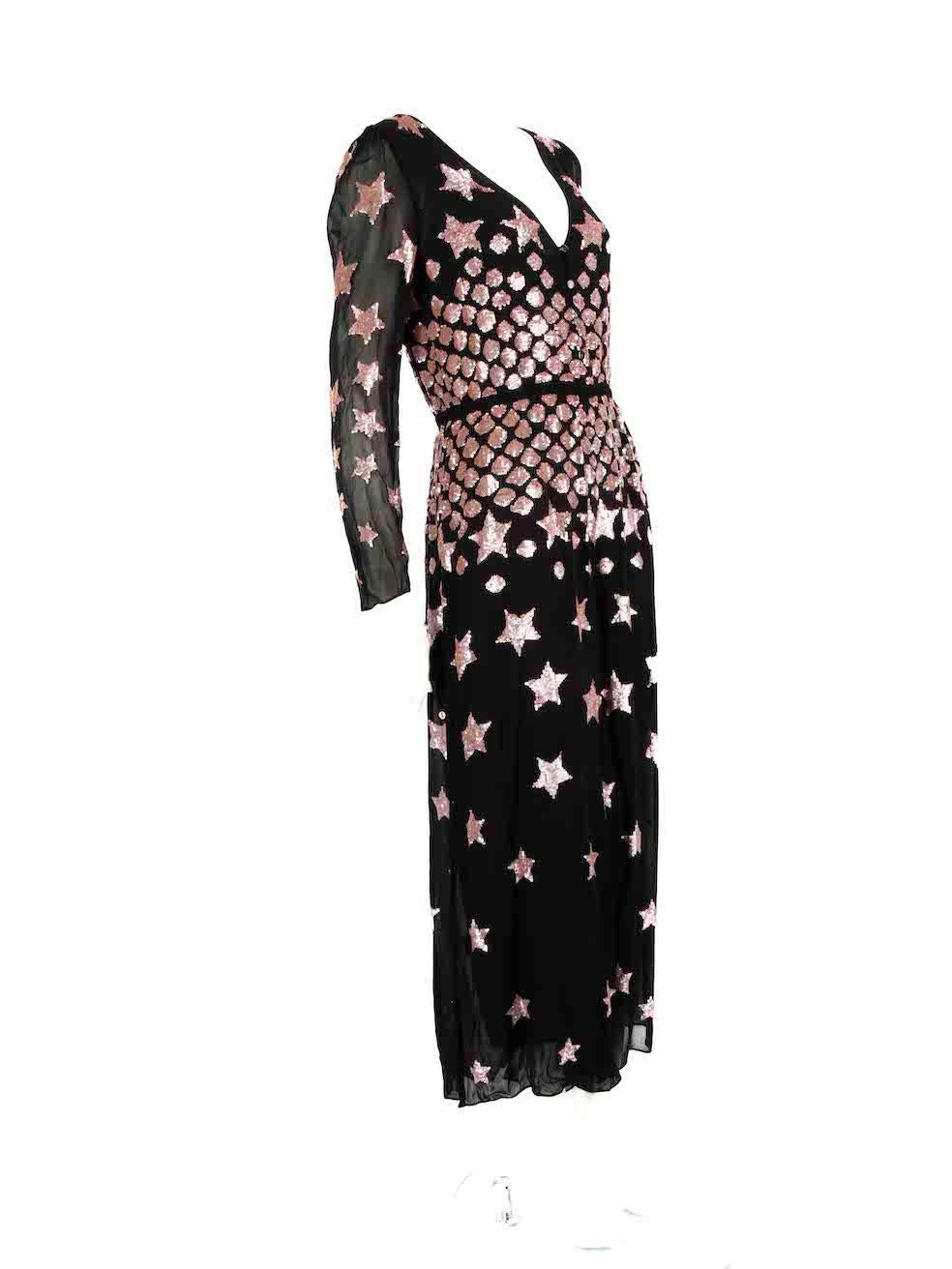 CONDITION is Good. Minor wear to jumpsuit is evident. Light wear to the left shoulder seam with a small tear and the embellishment across the front and back is missing some sequins on this used Temperley London designer resale item.
  
  Details
 