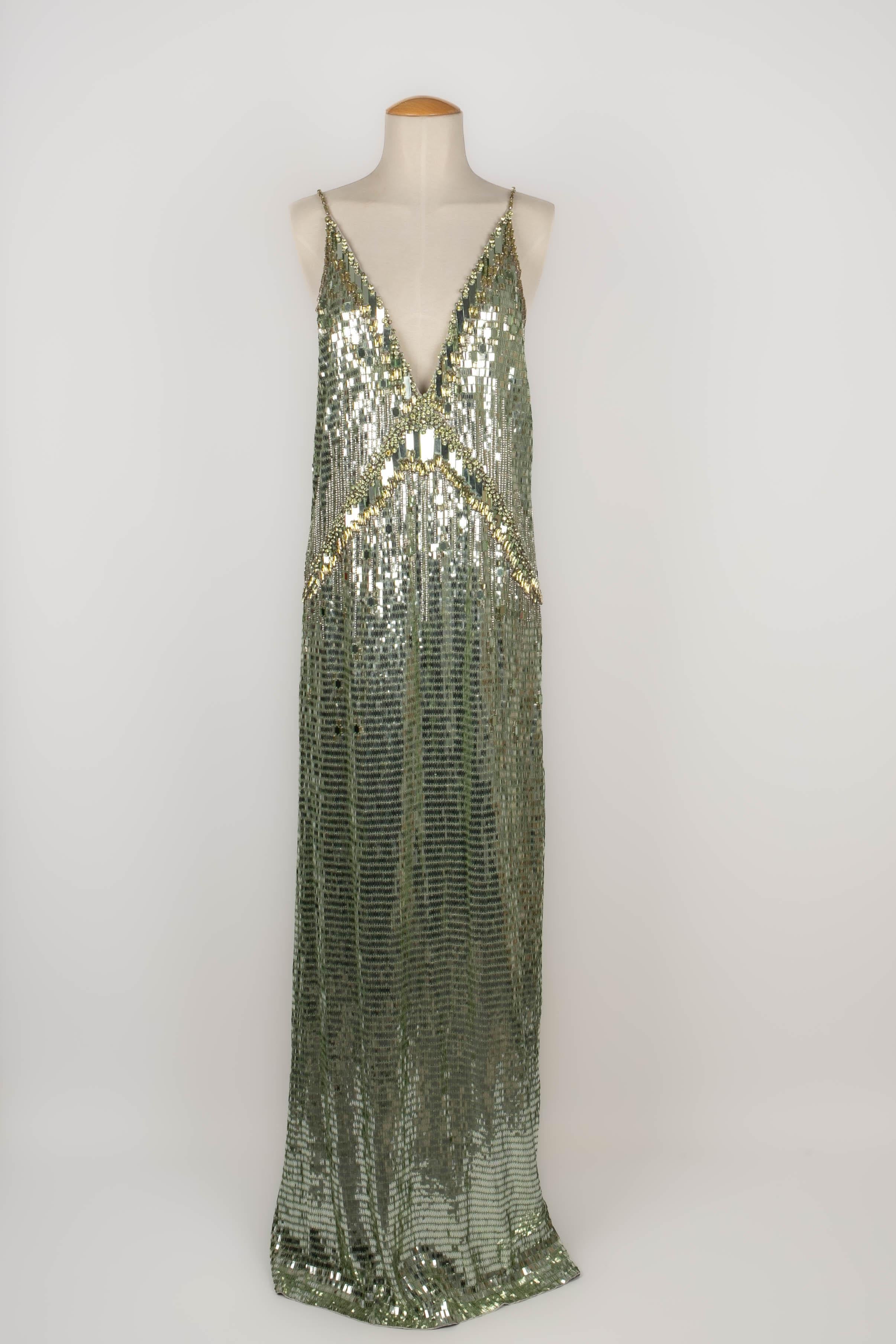 TEMPERLEY LONDON - Long silk dress entirely embroidered with green-tone sequins and rhinestones. 10UK size indicated, it fits a 38FR. 2016 Spring-Summer Collection.

Condition:
Very good condition

Dimensions:
Chest: 46 cm - Waist: 40 cm - Hips: 45