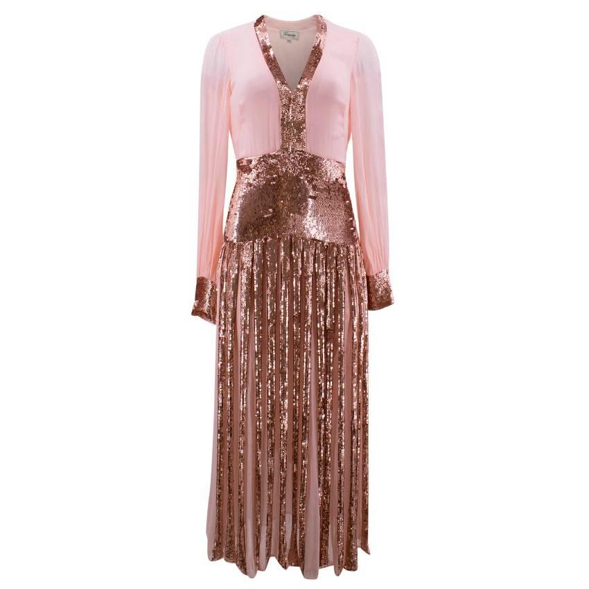 Temperley London candy pink midi dress in soft sheer embellished with hand-sewed beads on the neck line, on the cuffs and all over the skirt.

Fabrics: 100% Viscose.

Size:
XS
US 4
UK 8

Condition: 9.0/10.

Approx. Measurements:
Shoulders 40cm