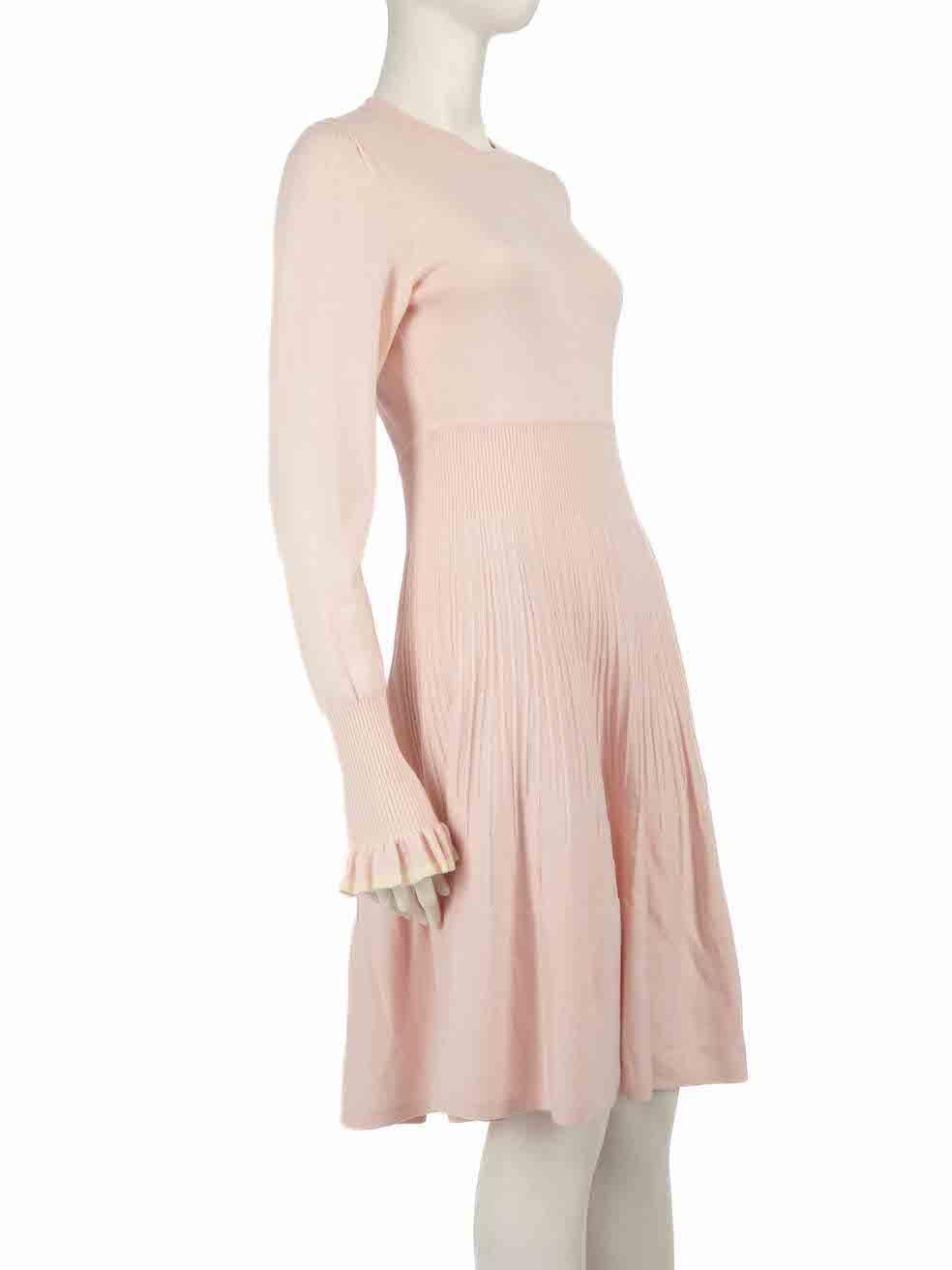 CONDITION is Very good. Minimal wear to dress is evident. Minimal wear to the front of the dress with small discolouration marks. Small mark on right sleeve cuff. Small hole seen on rear left sleeve on this used Temperley London designer resale
