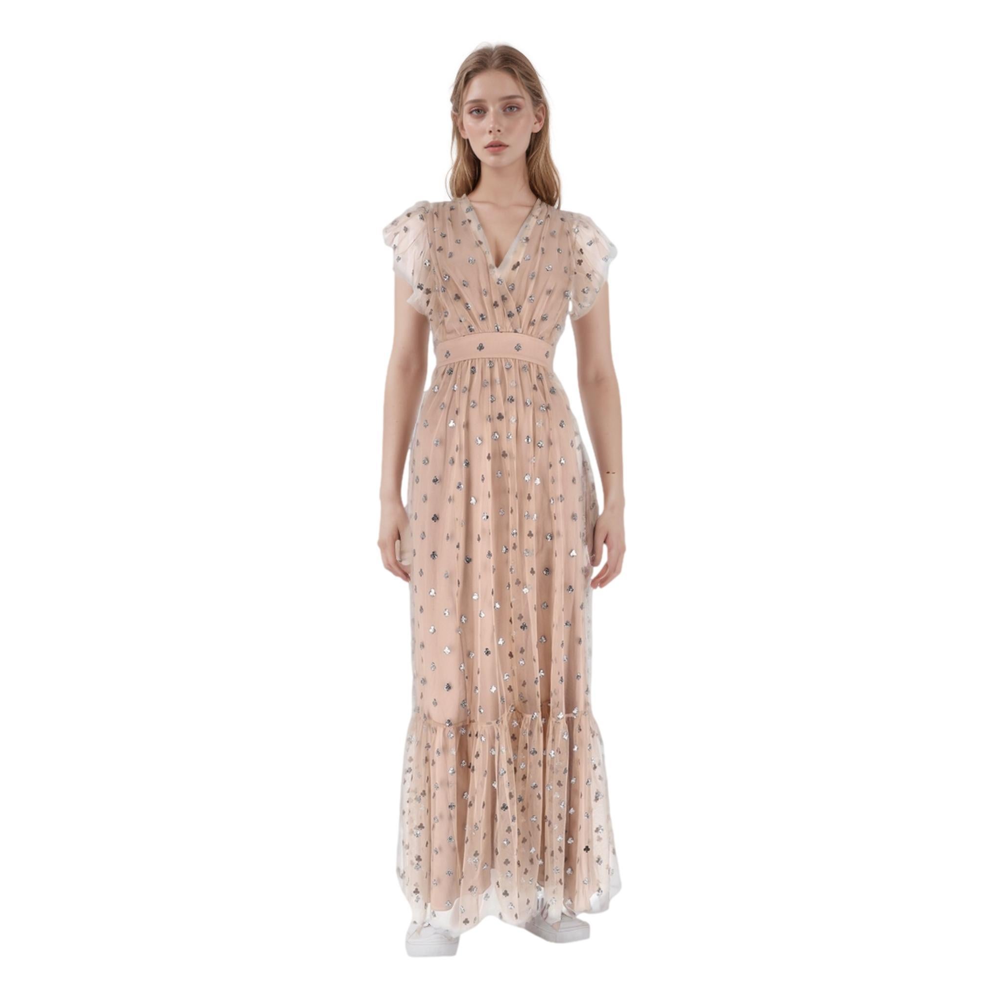 Temperley London Tulle Embellished Maxi Dress

Pink nude maxi dress designed with silver glitter embellishments to the tulle.

Featuring V-Neck, lace ruffle short sleeves and fitting at the waist. Rrp £2545

Size – 10UK

Condition – Very
