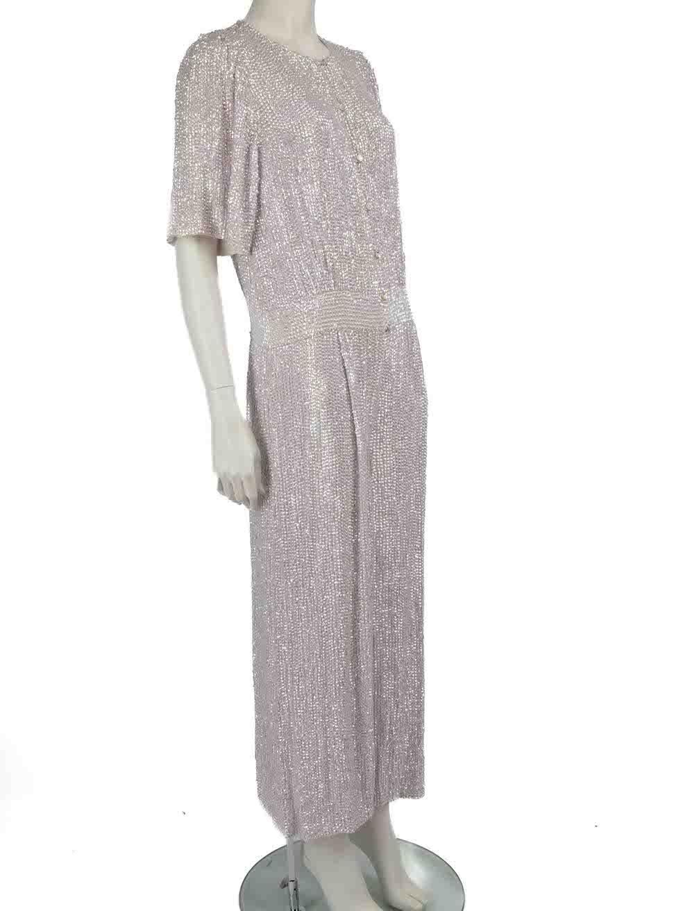 CONDITION is Never worn, with tags. No visible wear to jumpsuit is evident on this new Temperley London designer resale item.
 
 
 
 Details
 
 
 White
 
 Viscose
 
 Jumpsuit
 
 Short sleeves
 
 Sequin embellished
 
 Zip and button up fastening
 
