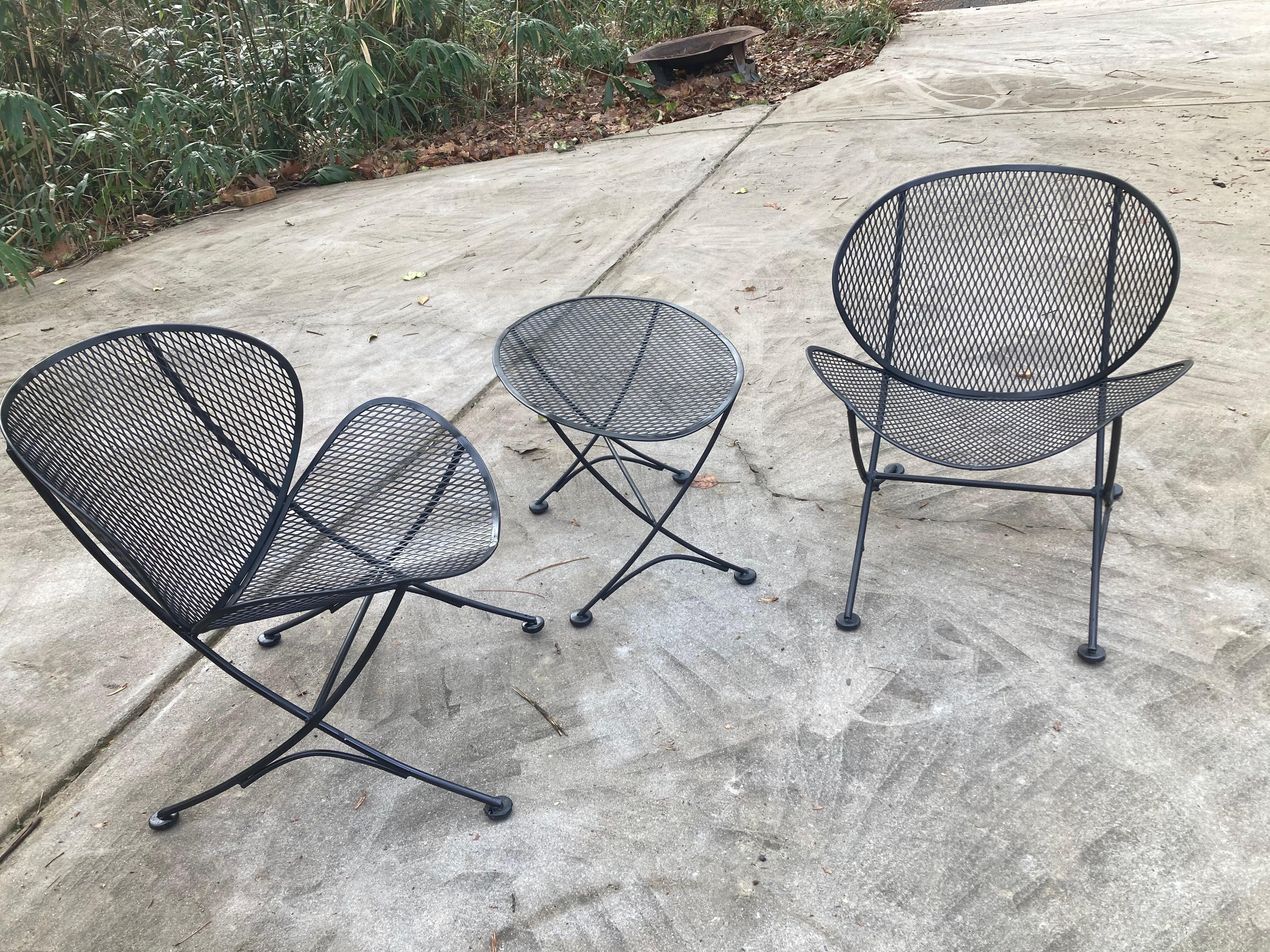 Chic set of 3 vintage Salterini pieces, to include 2 lounge chairs and a small coffee table. Designed by Maurizio Tempestini, known as the Orange Slice pattern, circa 1950/1960's. The set is in very good condition, structurally sound and sturdy,