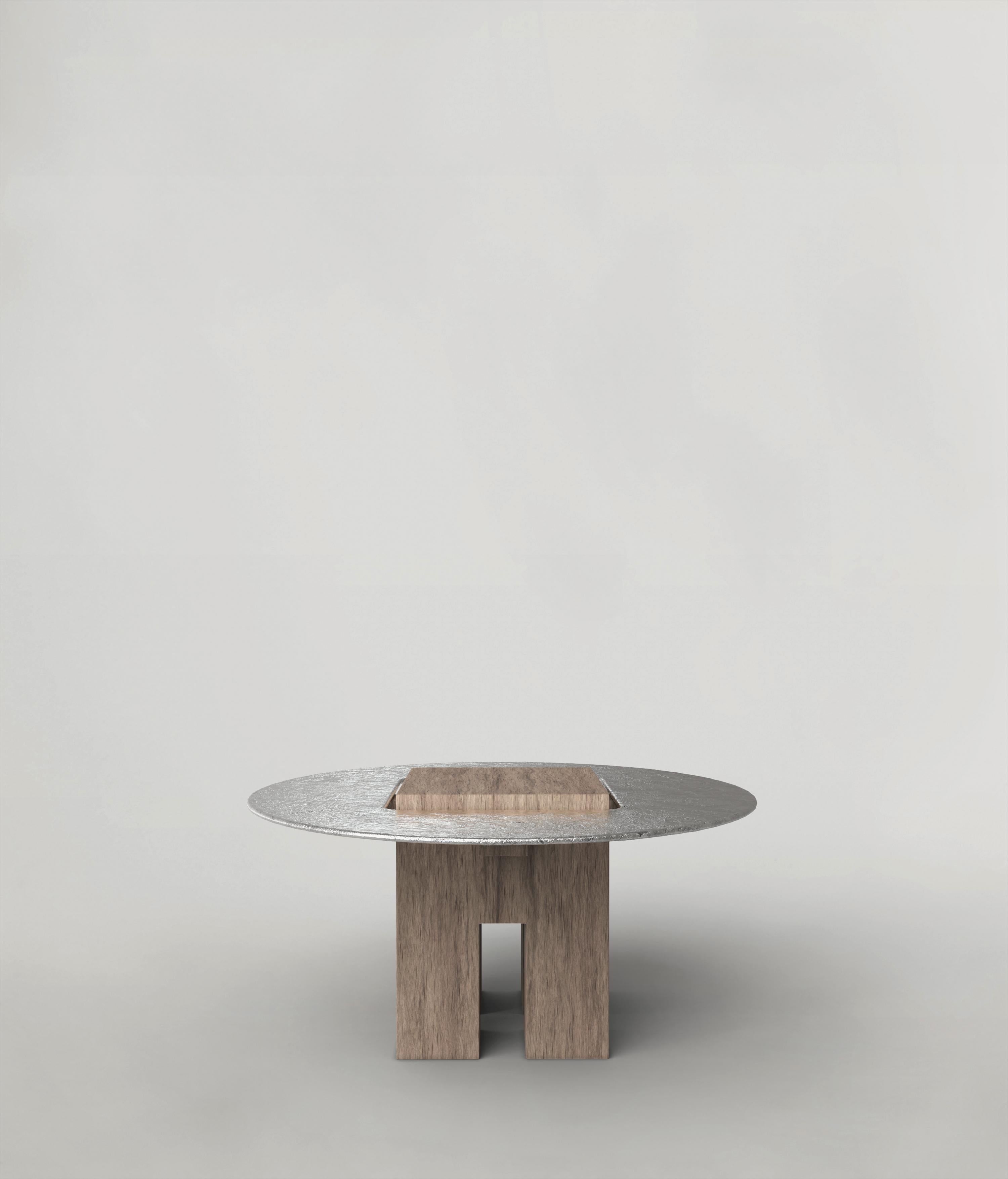 Tempio V1 Low Table by Edizione Limitata
Limited Edition of 150 pieces. Signed and numbered.
Dimensions: D82 x W82 x H40 cm
Materials: Solid Ash Wood+Aluminum

Tempio is a collection of contemporary sculptural table made by Italian artisans in