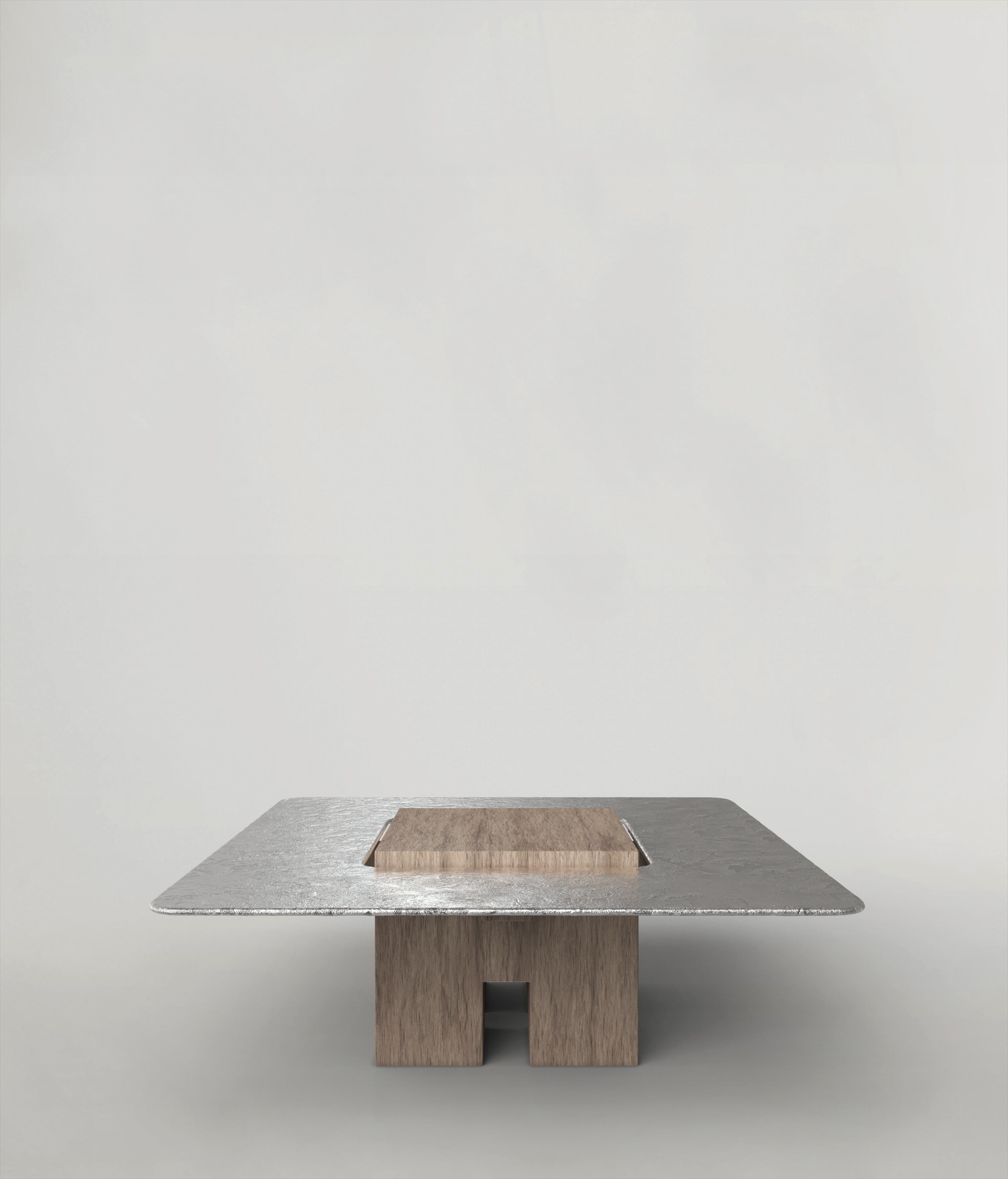 Tempio V2 Low Table by Edizione Limitata
Limited Edition of 150 pieces. Signed and numbered.
Dimensions: D92 x W92 x H32 cm
Materials: Solid Ash Wood+Aluminum

Tempio is a collection of contemporary sculptural table made by Italian artisans in