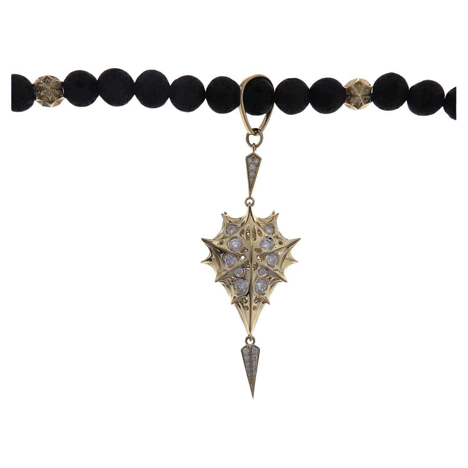 This exquisite 18K gold and diamond necklace from the Thoscene Collection is a masterpiece of sacred geometry and modern design, blending artistry, elegance, and meaning. Inspired by the fractal patterns of the Borobudur Temple in Indonesia, a place