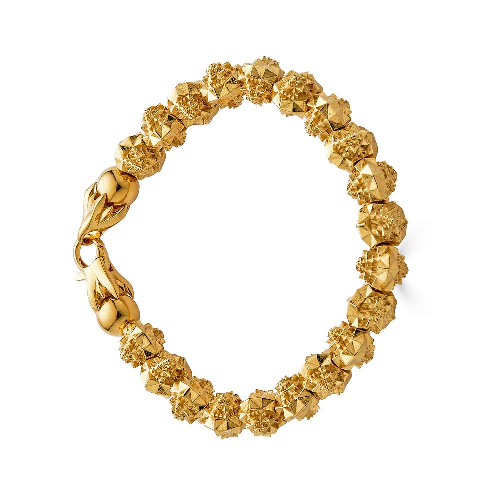 BREVARD TEMPLE COLLECTION

This Fractal sacred geometry 18k gold bracelet is inspired by the Borobudor temple in Indonesia. This temple was used as a meditation space to empower the individual and instill peace within. 

This piece is part of the