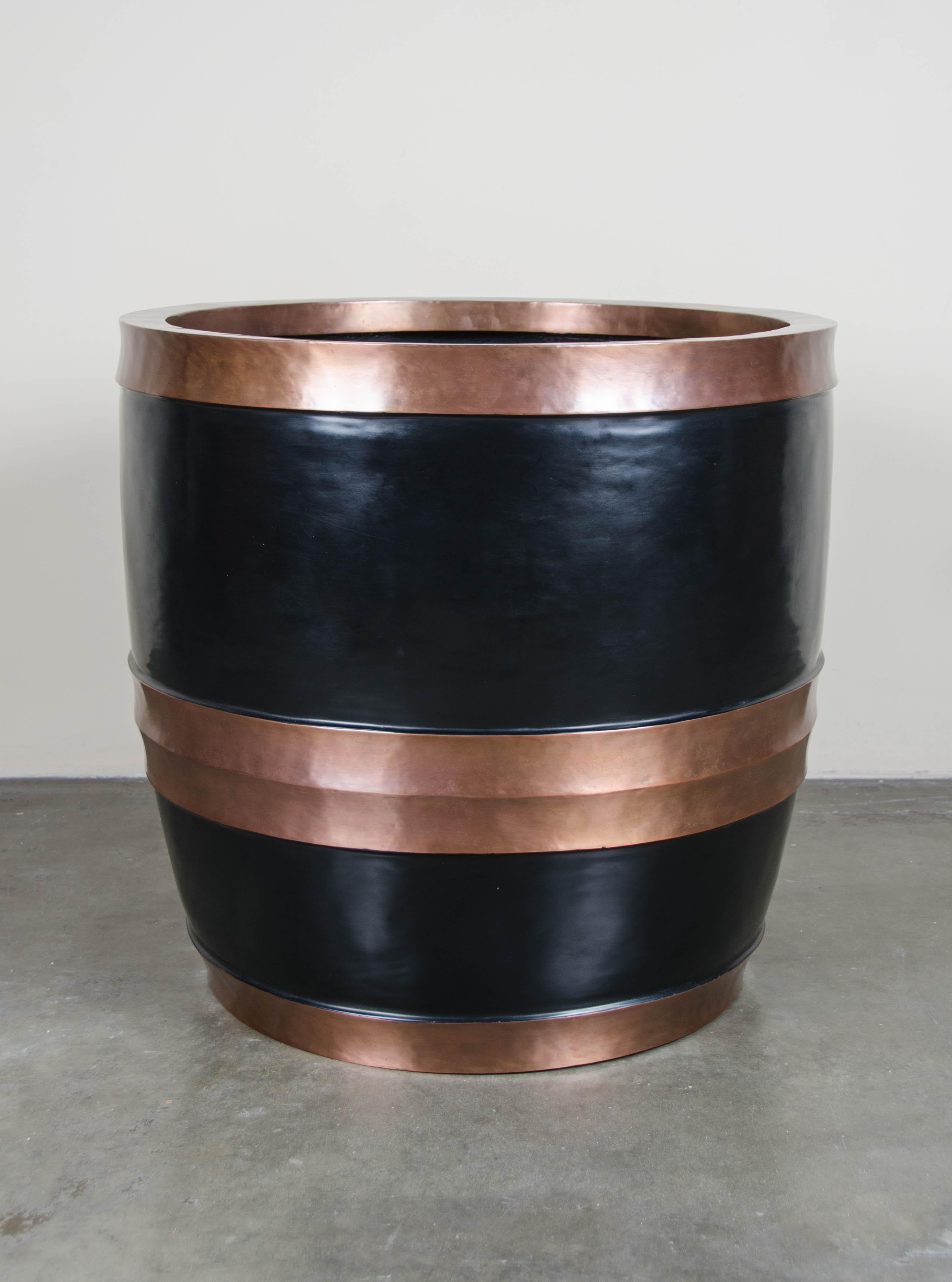 Antique copper finish on copper band
Hand repousse´
Black lacquer
Contemporary
Limited Edition


Chinese lacquer is a highly regarded art form and the earliest example dates back to the Shang Dynasty, circa 1600-1100 B.C. The term lacquer refers to