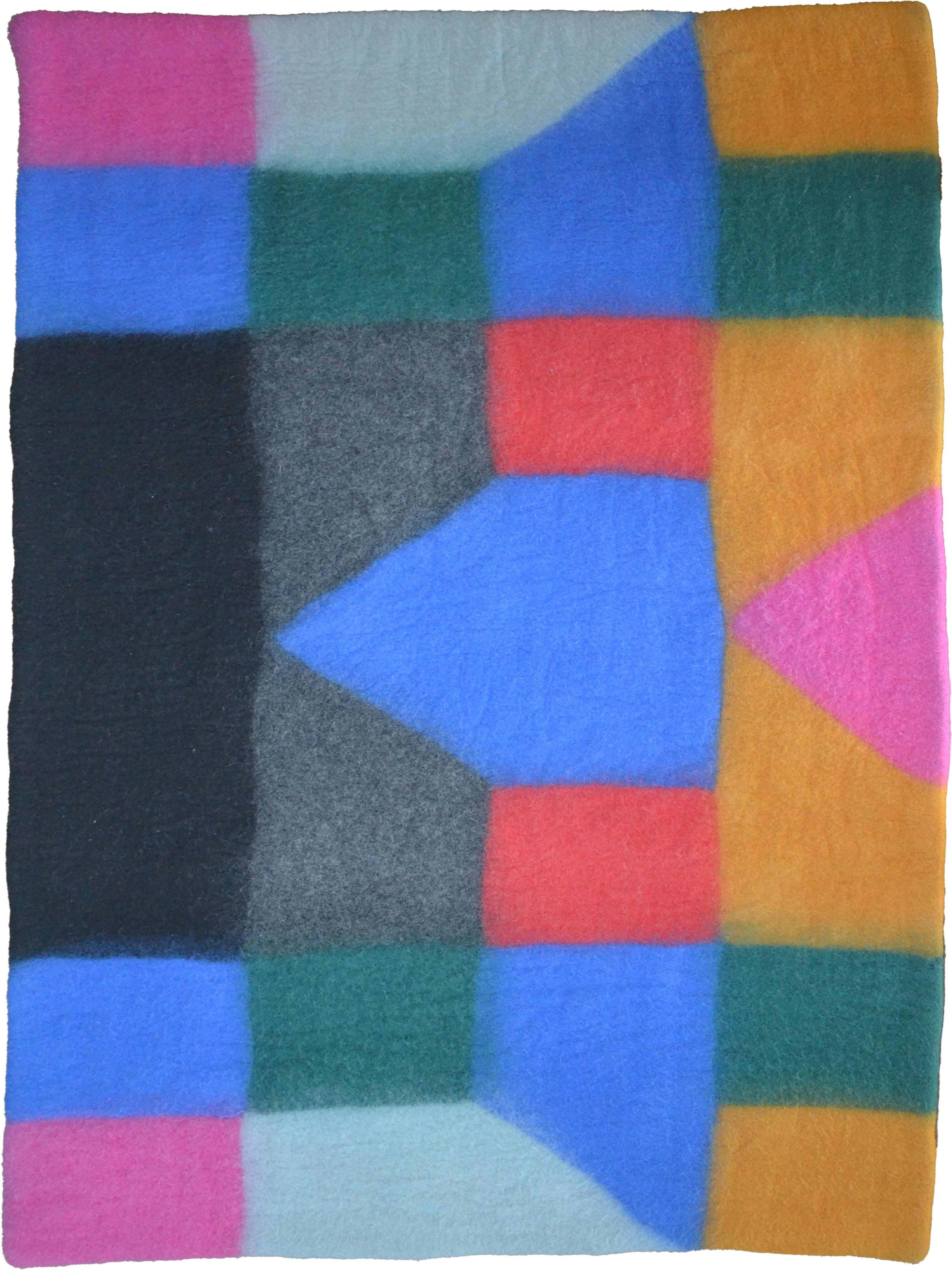 This rug is extremely unique. The history of wool felt rugs began with nomadic tribes in the Central Asian Steppes. I have been producing and designing this extremely rare form of rug making since 2002 in Iran, Turkey and now, Nepal. The price is