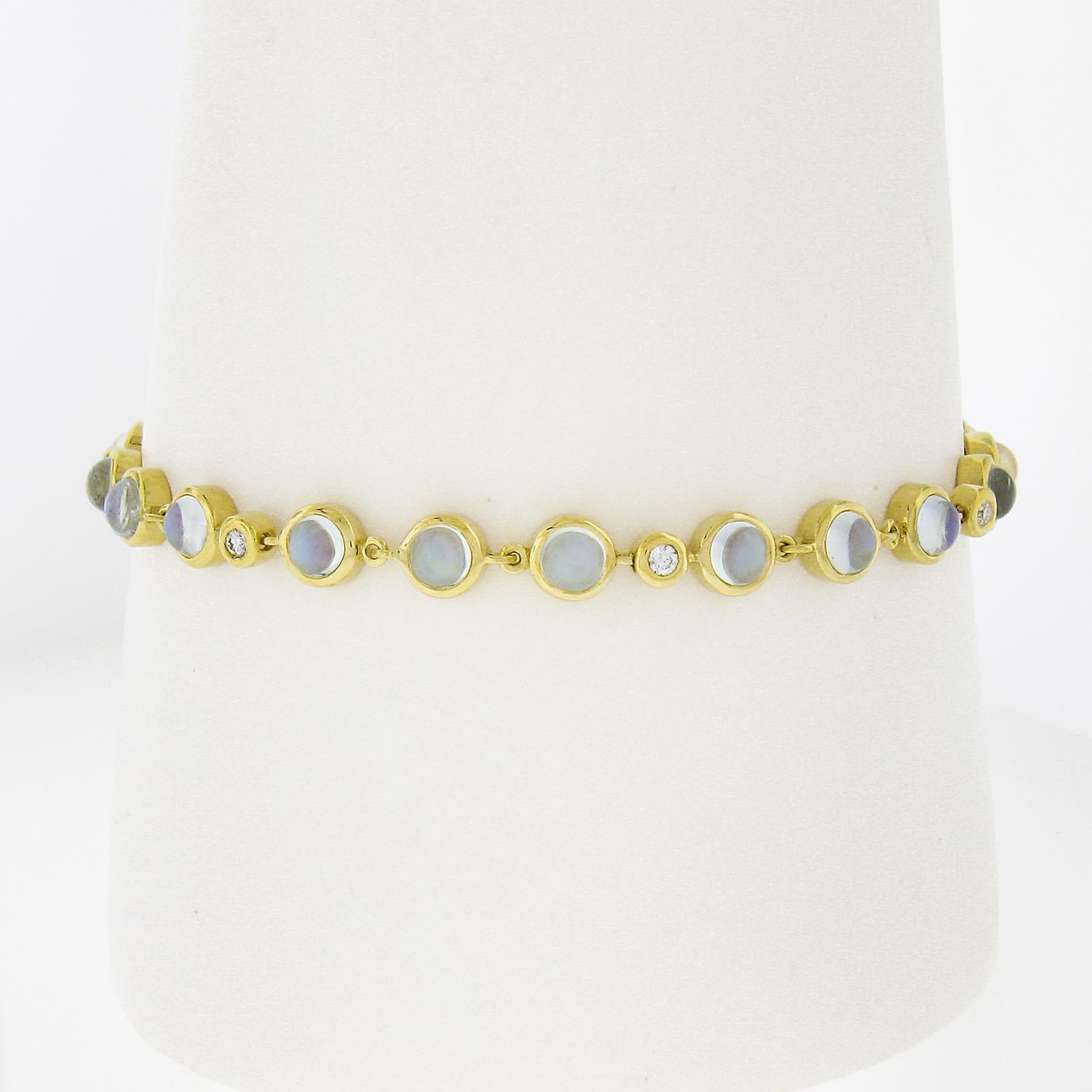 --Stone(s):--
(19) Natural Genuine Moonstone - Round Cabochon Cut - Bezel Set - Translucent White Color w/ Blue Play of Color - 3.5mm (approx.)
(12) Natural Genuine Diamonds - Round Brilliant Cut - Bezel & Pave Set   (approx.)

Material: 18K Solid