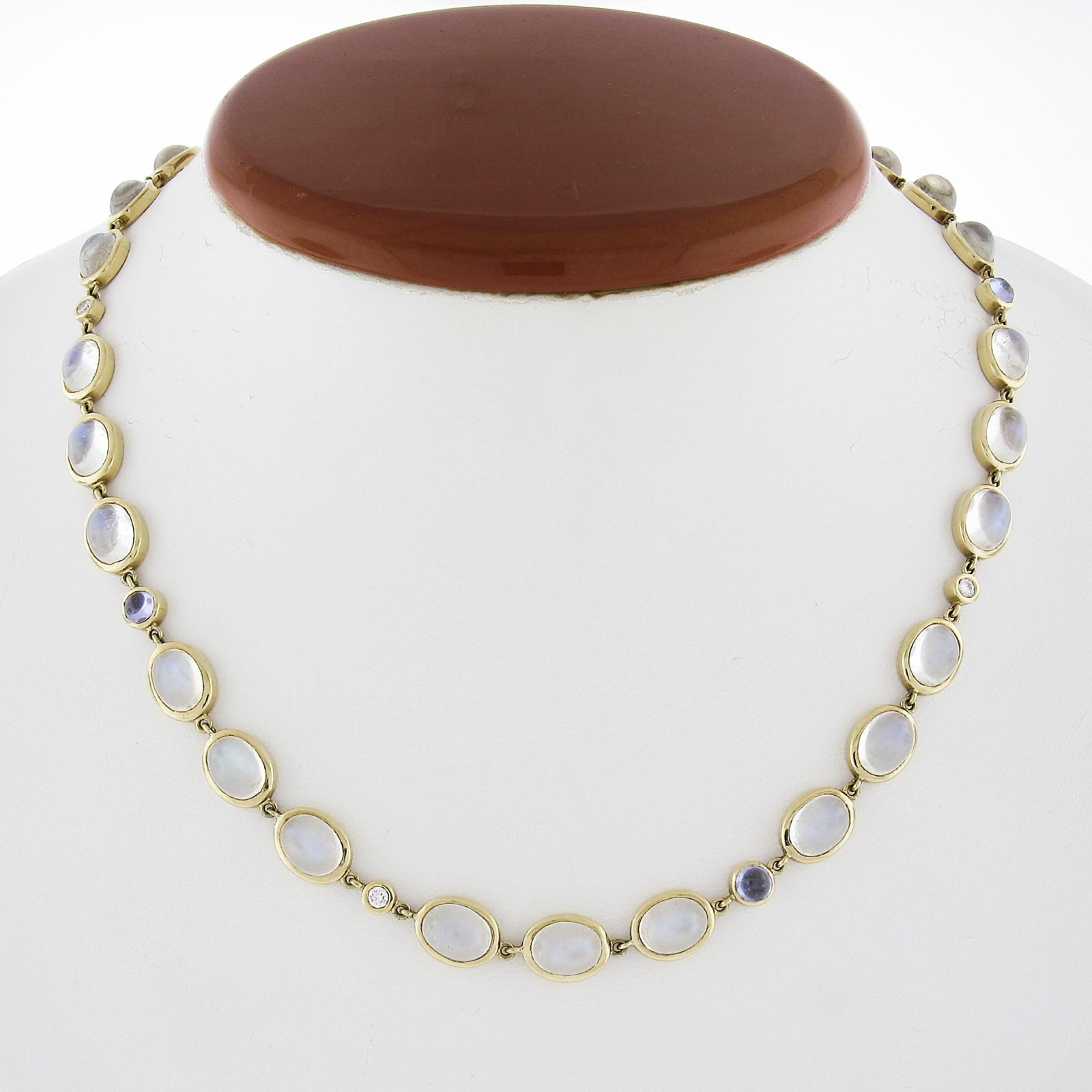 --Stone(s):--
(4) Natural Genuine Diamonds - Round Brilliant Cut - Bezel Set
(4) Natural Genuine Tanzanite - Round Cabochon Cut - Bezel Set - Blue Color
(27) Natural Genuine Moonstones - Oval Cabochon Cut - Bezel Set - Blue Color - 8x6mm