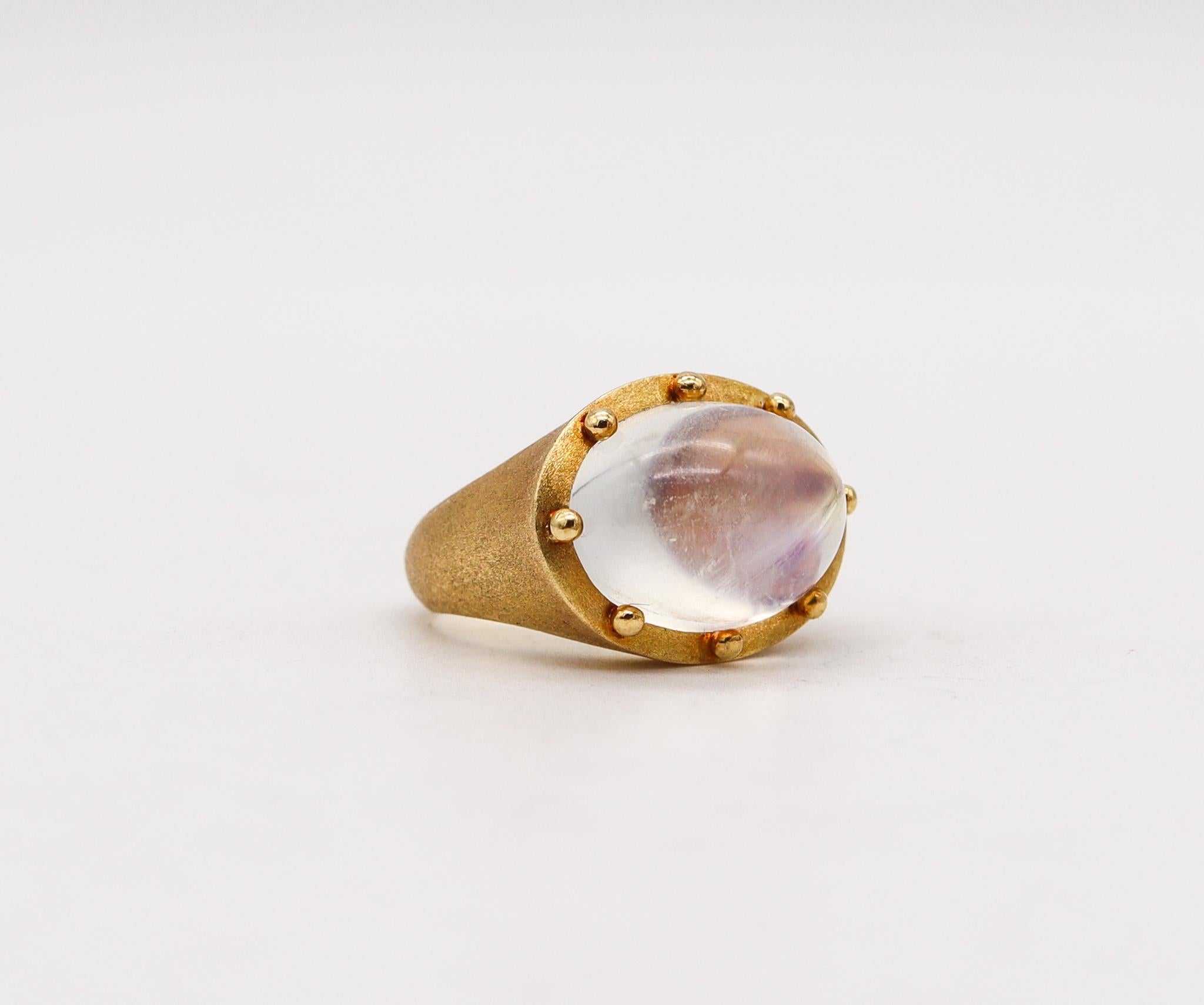 Cocktail ring designed by Temple St. Claire.

Gorgeous cocktail ring created by the jewelry designer Temple St. Claire. This cocktail ring was crafted in solid yellow gold of 18 karats with a thin and delicate brushed finish. Made at her studio