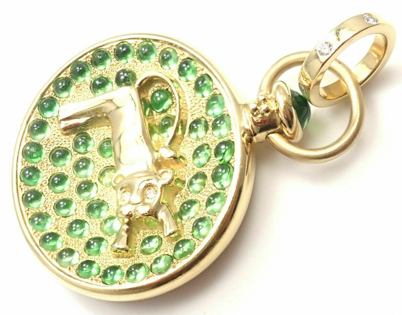 18k Yellow Gold Diamond Tsavorite Garnet Terrae Lion Charm Pendant by Temple St Clair. 
This piece comes with a pouch. 
With Round Diamonds total weight (0.13ct) and Tsavorite: 4.3 ct
Details: 
Measurements: 31mm in diameter and 47mm in length with