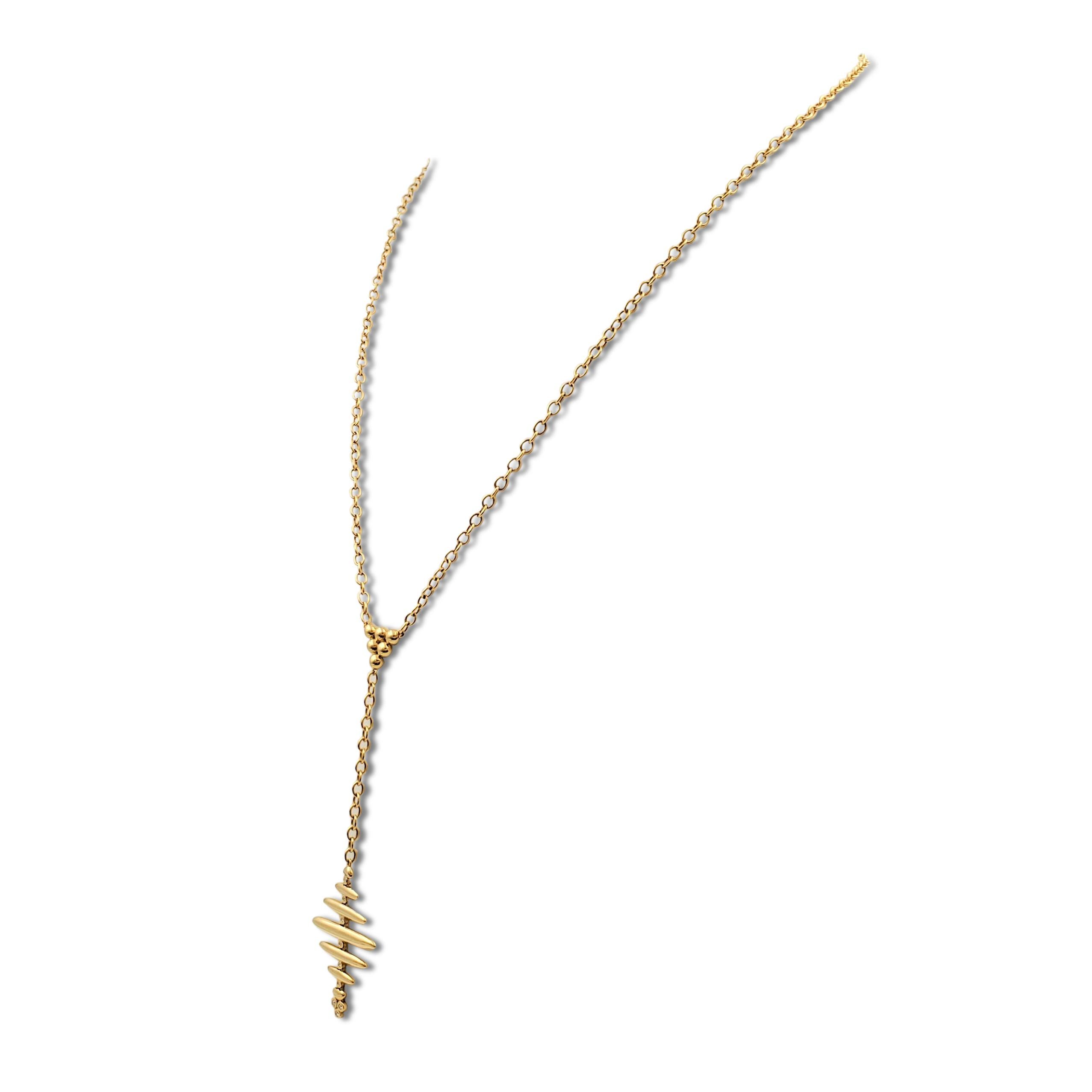 Authentic Temple St. Clair 'Honeycomb' necklace crafted in 18 karat yellow gold comprised of interlocking circular link chain that is completed by a dangling pendant which centers on moving gold bars and bezel-set round brilliant cut diamond