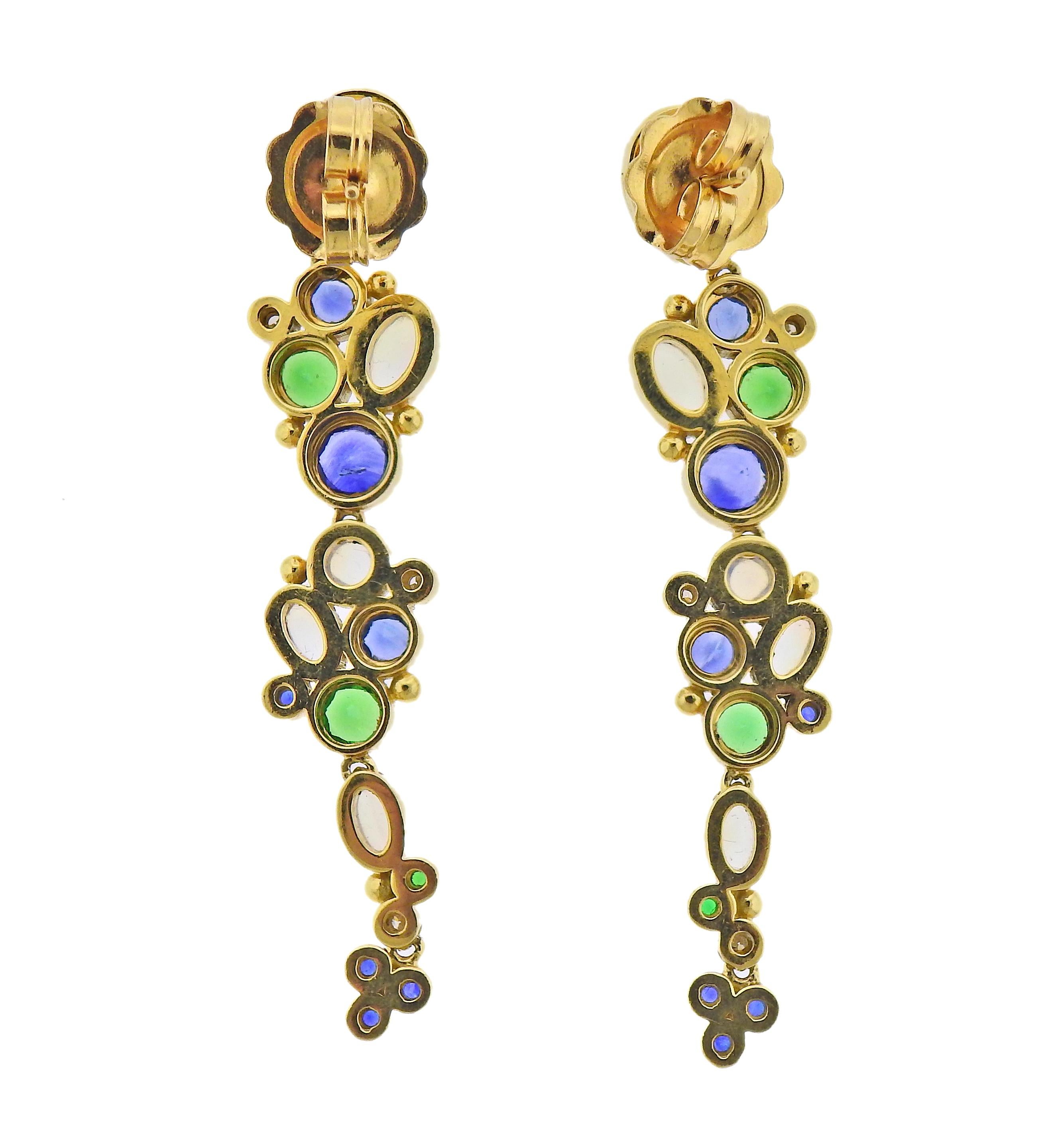 Pair of 18k gold drop earrings by Temple St. Clair, set with moonstones, tsavorites, sapphires and approx. 0.12cts in diamonds. Earrings are 58mm x 11mm. Marked: 750 and with a Temple mark. Weight - 16.4 grams.