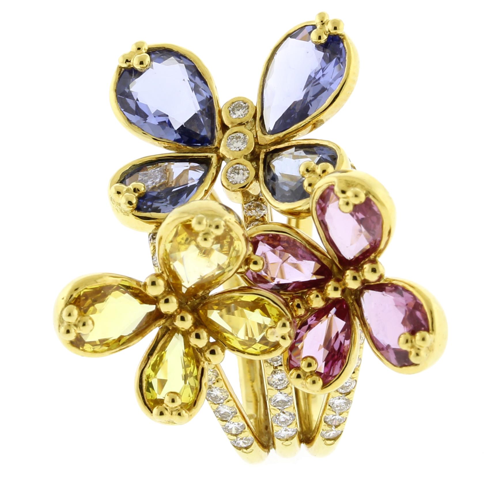 This ring has three butterflies one with blue sapphires, pink sapphires and yellow sapphires.  The butterflies each can move front to back.
♦ Designer: Temple St. Clair
♦ Metal: 18 karat yellow gold
♦ Gemstones: Diamonds, Blue, Pink and Yellow