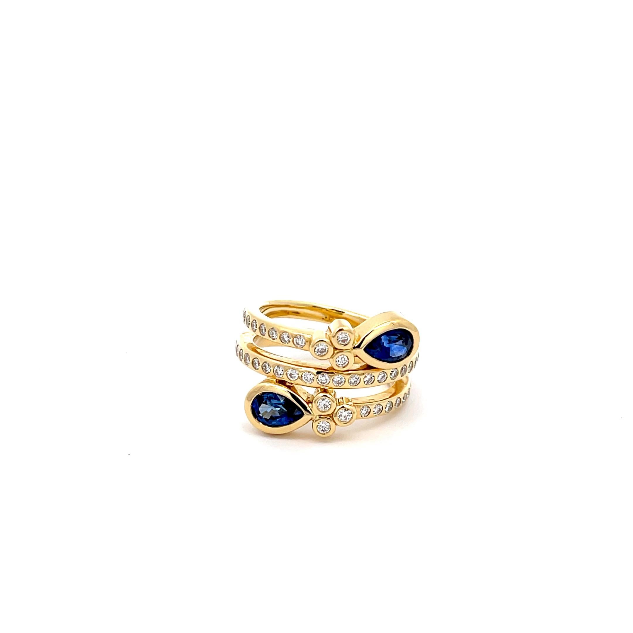 Temple St. Clair Sapphire and Diamond Wrap Ring in 18K Yellow Gold. The ring features two pear shape sapphires and brilliant round cut diamonds. Size 6.5