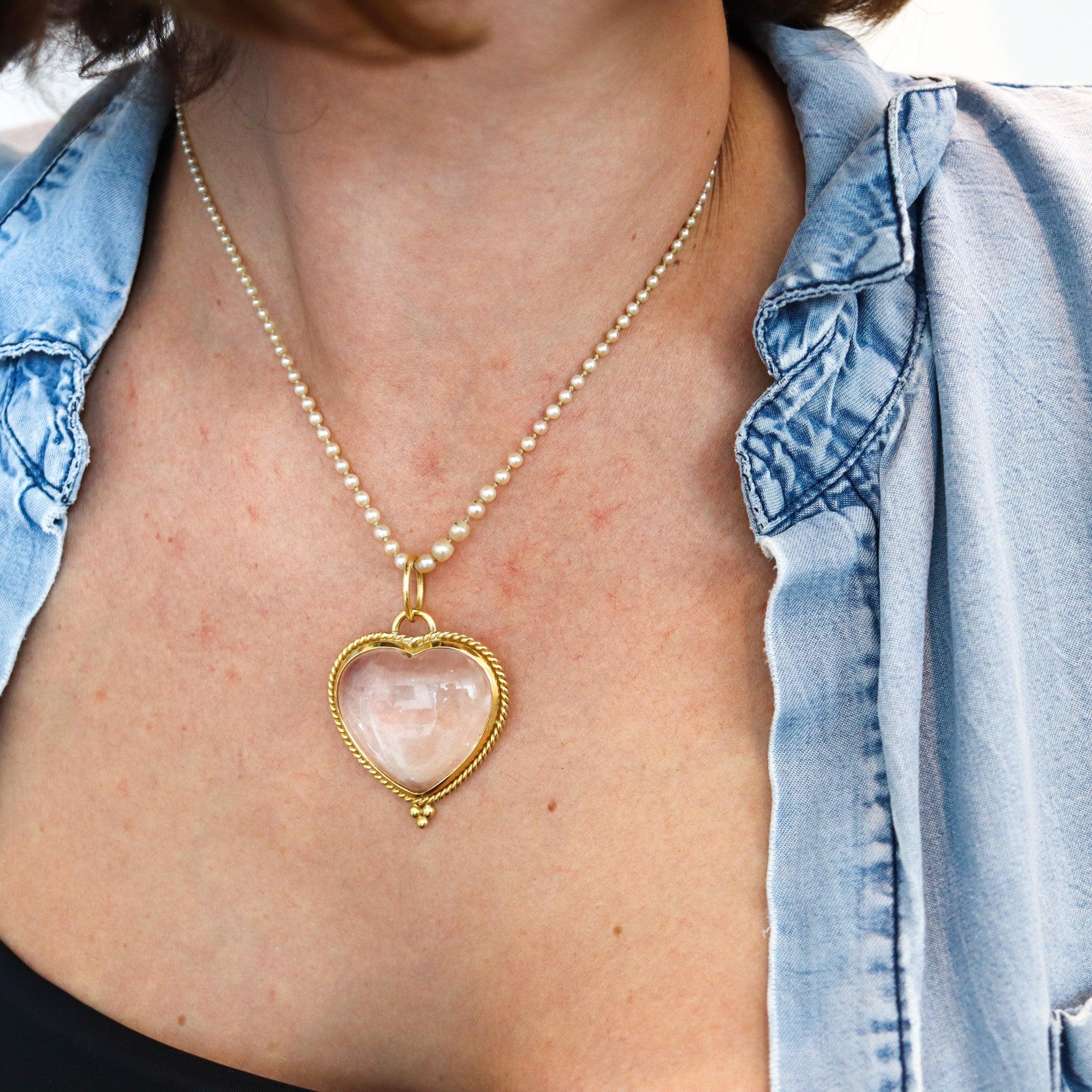 Heart pendant designed by Temple St. Clair.

Beautiful and unusual heart shaped pendant, created in Italy by the jewelry designer Temple St. Clair. The rare pendant has been crafted at her workshop studio, with twisted byzantine patterns in solid