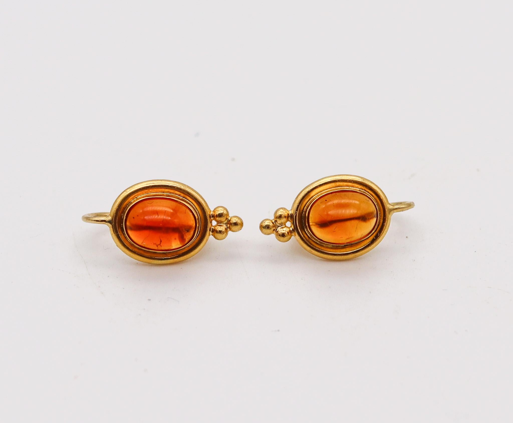 Dangle earrings designed by Temple St. Clair.

Gorgeous pair of French dangle earrings, created in Italy by the jewelry designer Temple St. Claire. These earrings were carefully crafted in the Greek revival style in solid yellow gold of 22 karats