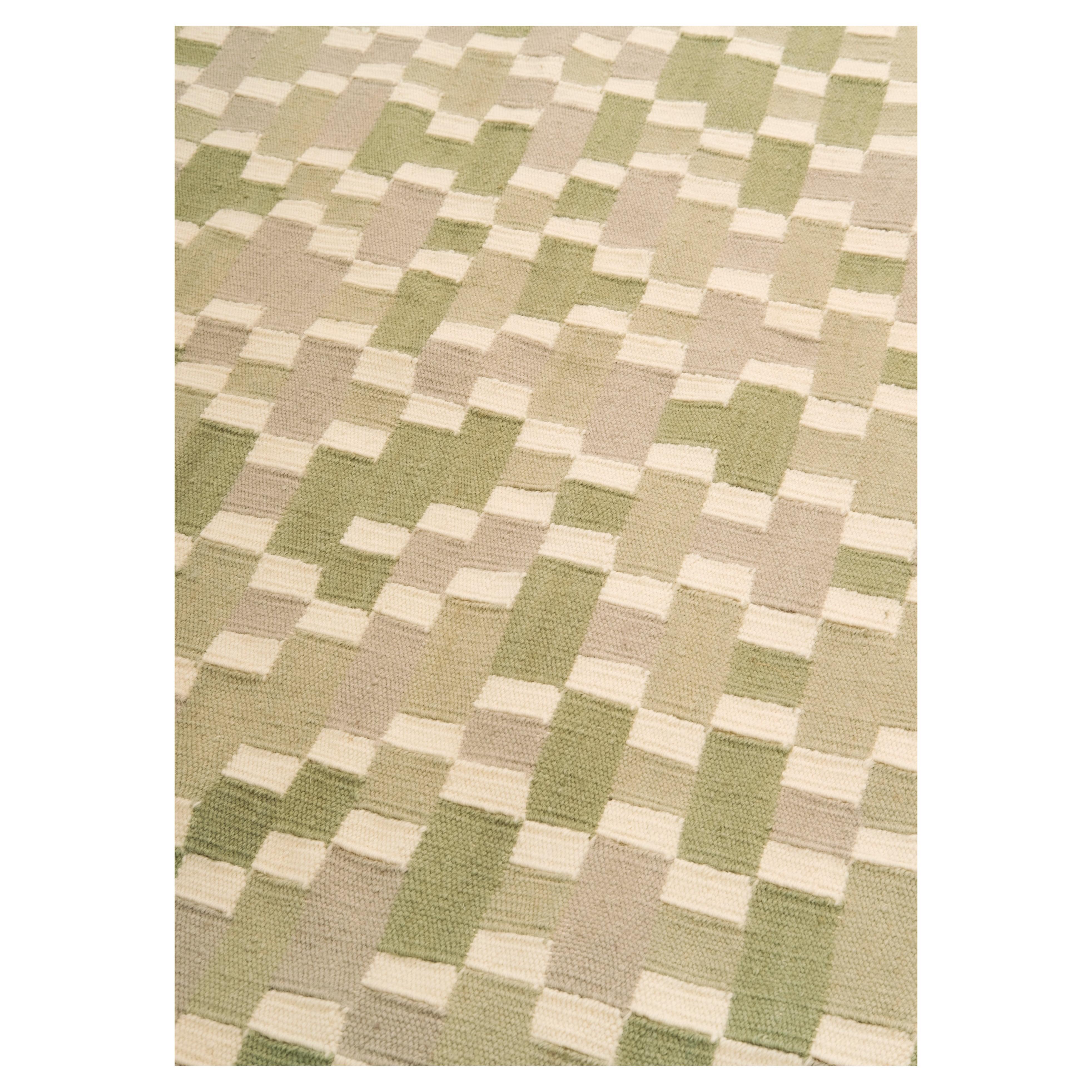 Tempo Cinque - Green

This Kilim rug is lightweight and breathable.
Available in stock, has been used once for a magazine photo shooting.

Woollen weave with geometrical motifs in a sophisticated colour combinations. The lightness of a traditional