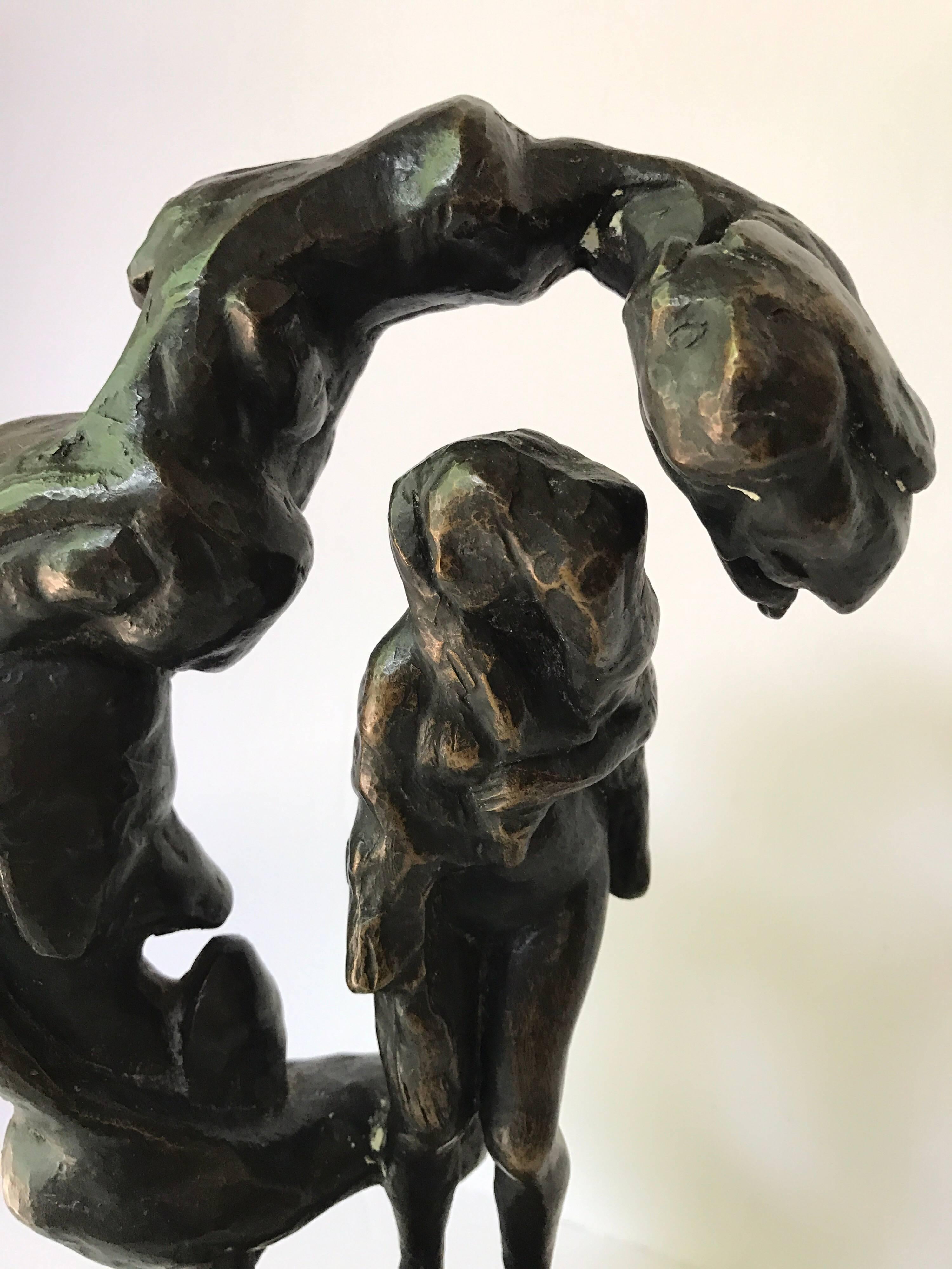 Magnificent bronze sculpture on marble base with tag that gives title and price paid back in the 1970s.
Weinberg's signature is on the serpents leg. The sculpture depicts the temptation of Eve with a large serpent enveloping Eve. Nothing short of