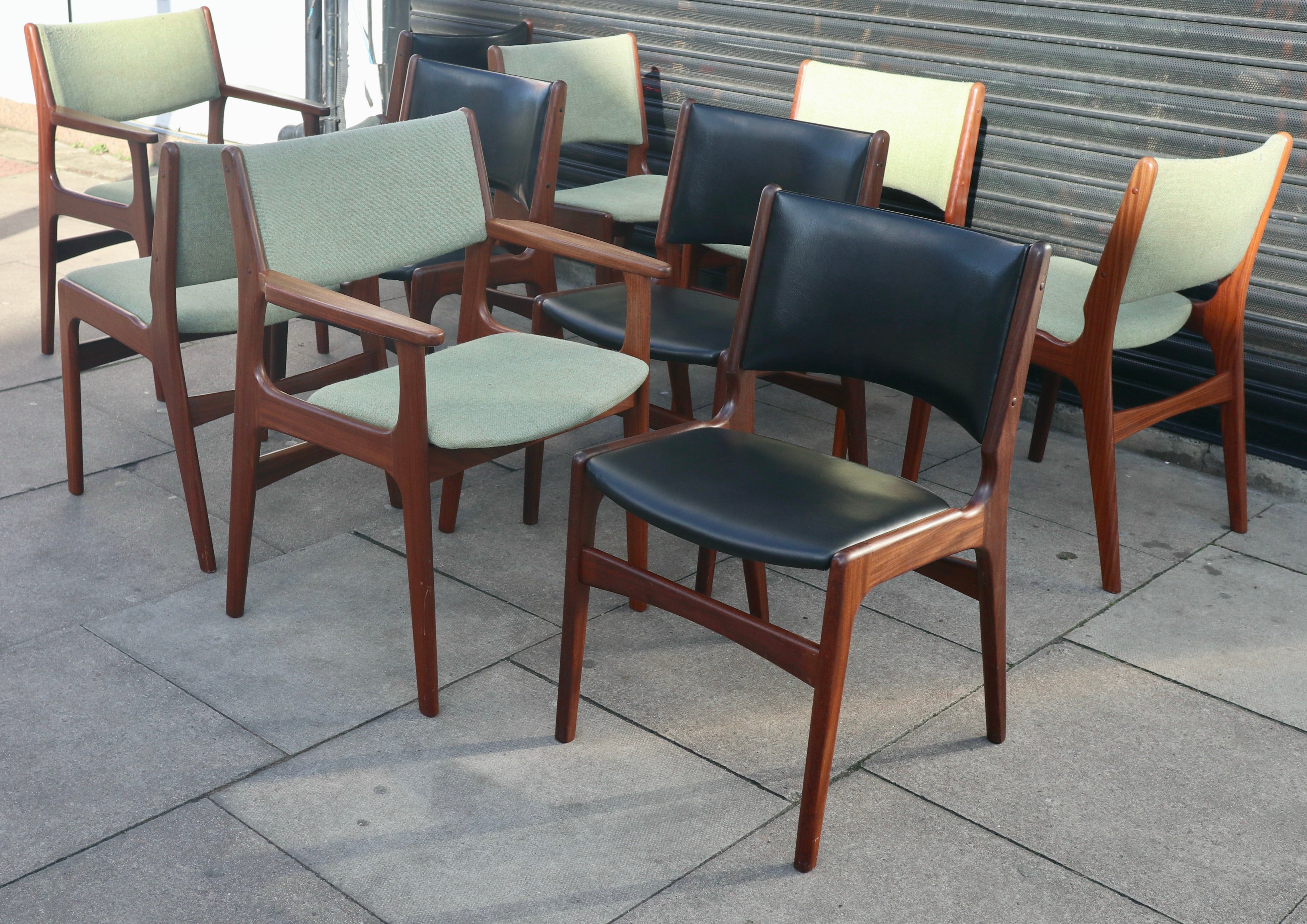 A stylish and rare set of ten model 89, Danish solid teak framed dining chairs, including 2x carver chairs, six with original light green coloured textile upholstery, and four chairs with original black vinyl.  Designed by Erik Buch for povl
