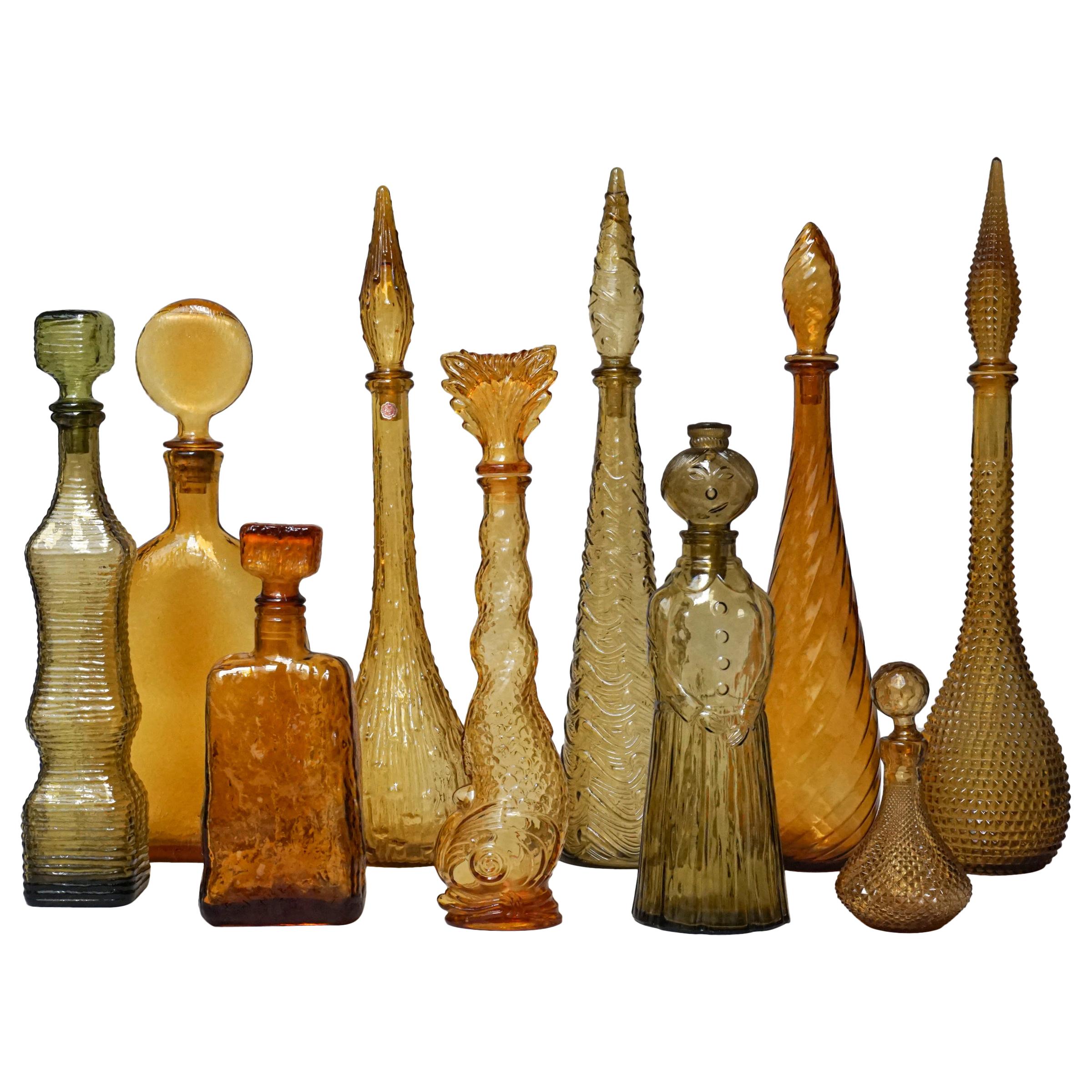 Ten 1960s Vintage Italian Amber Glass Empoli 'Genie' Decanters Liquor Bottles