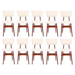 Ten 20th Century Light Crème Boucle and Cherry Wood Butterfly Chairs 1960 Europe