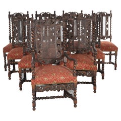 Dix chaises anciennes de style élisabéthain et jacobéen en chêne sculpté et à dossier en canne, C1900