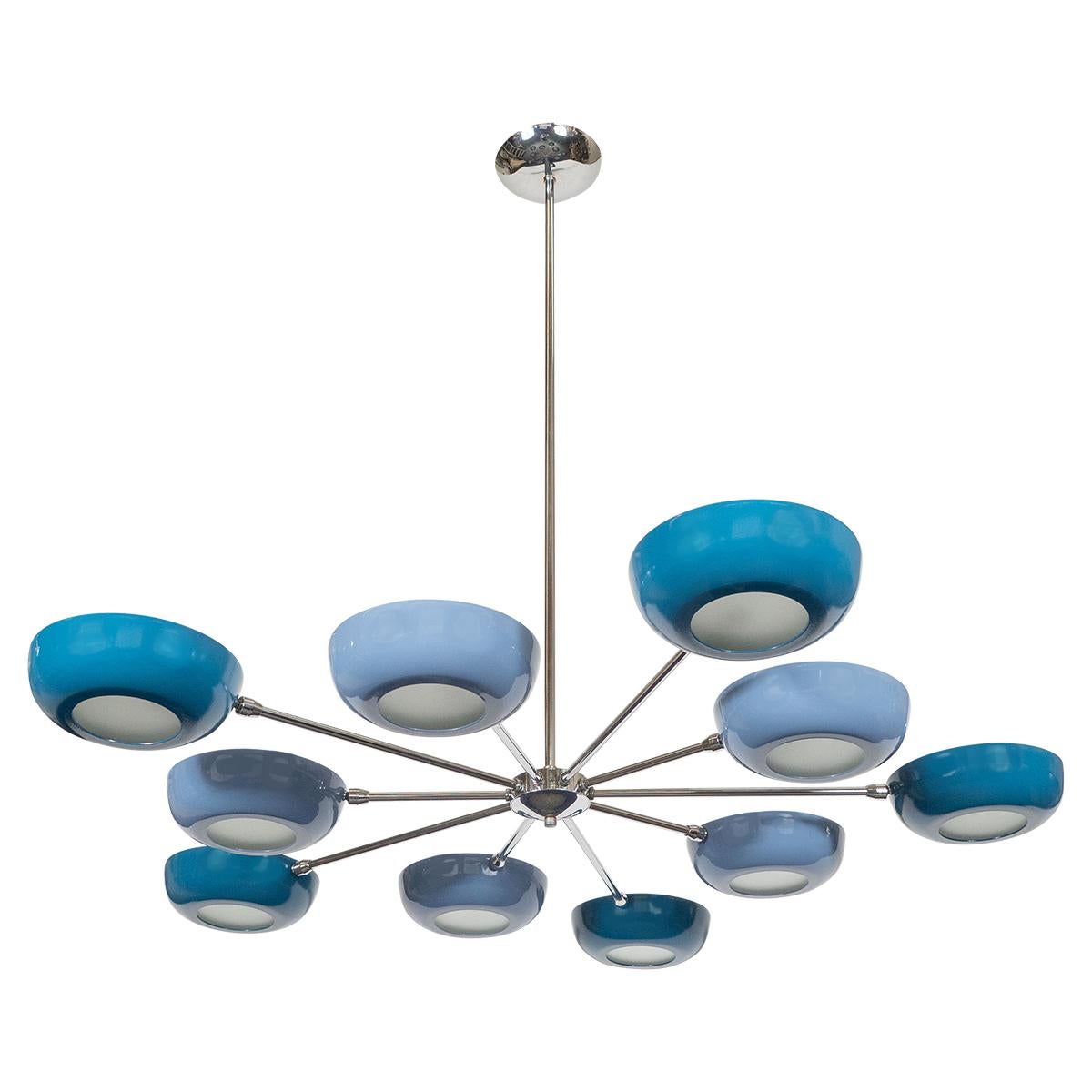 Ten-arm polished nickel starburst style chandelier with enameled metal and frosted glass shades.