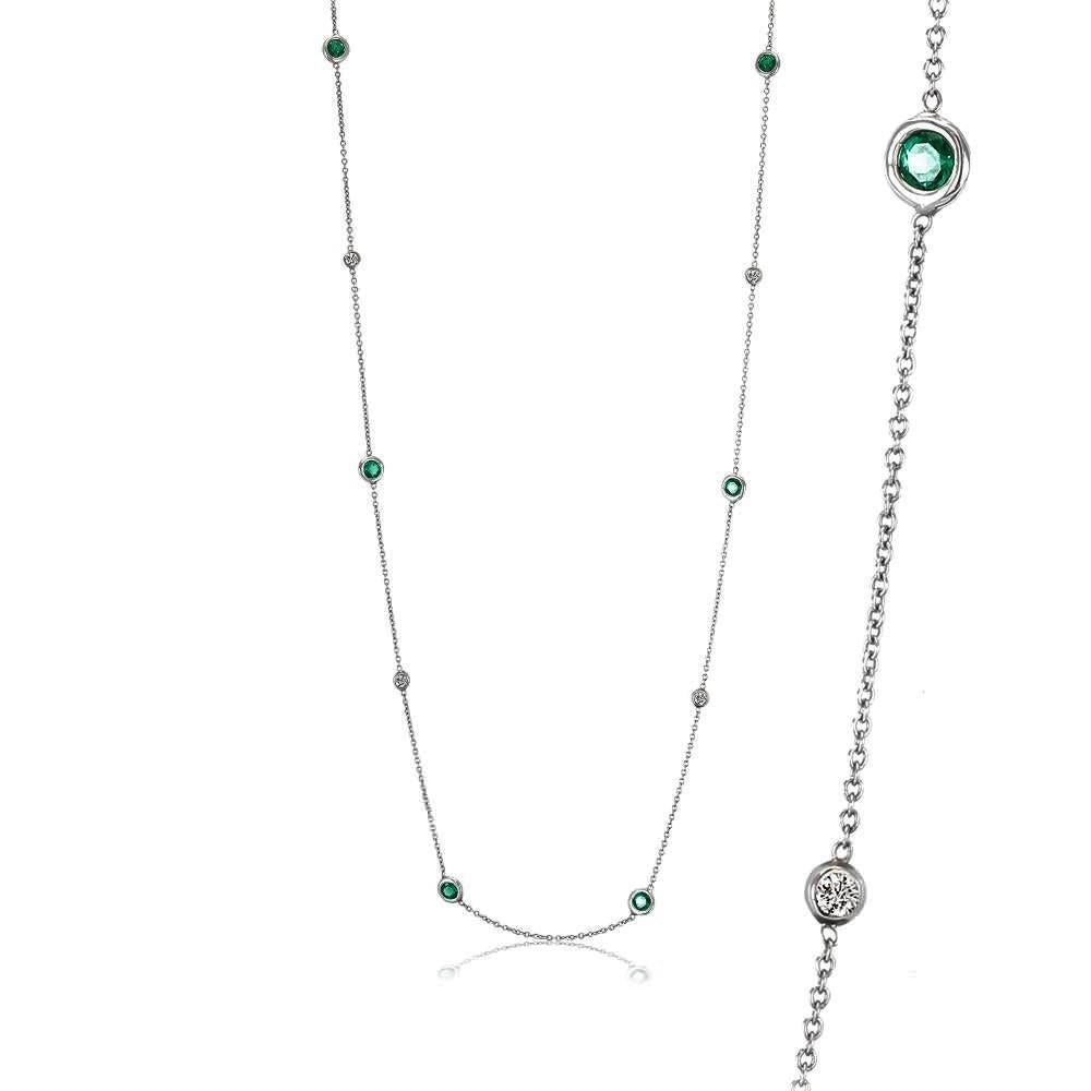 Featuring 14 karat white gold necklace pendant 
10 bezel-set round diamonds weight 0.20 carats 
10 Round emeralds weight 0.85 carat
16 inch long
Cable chain necklace with spring lock: a lock that fastens with a spring bolt
New Necklace

