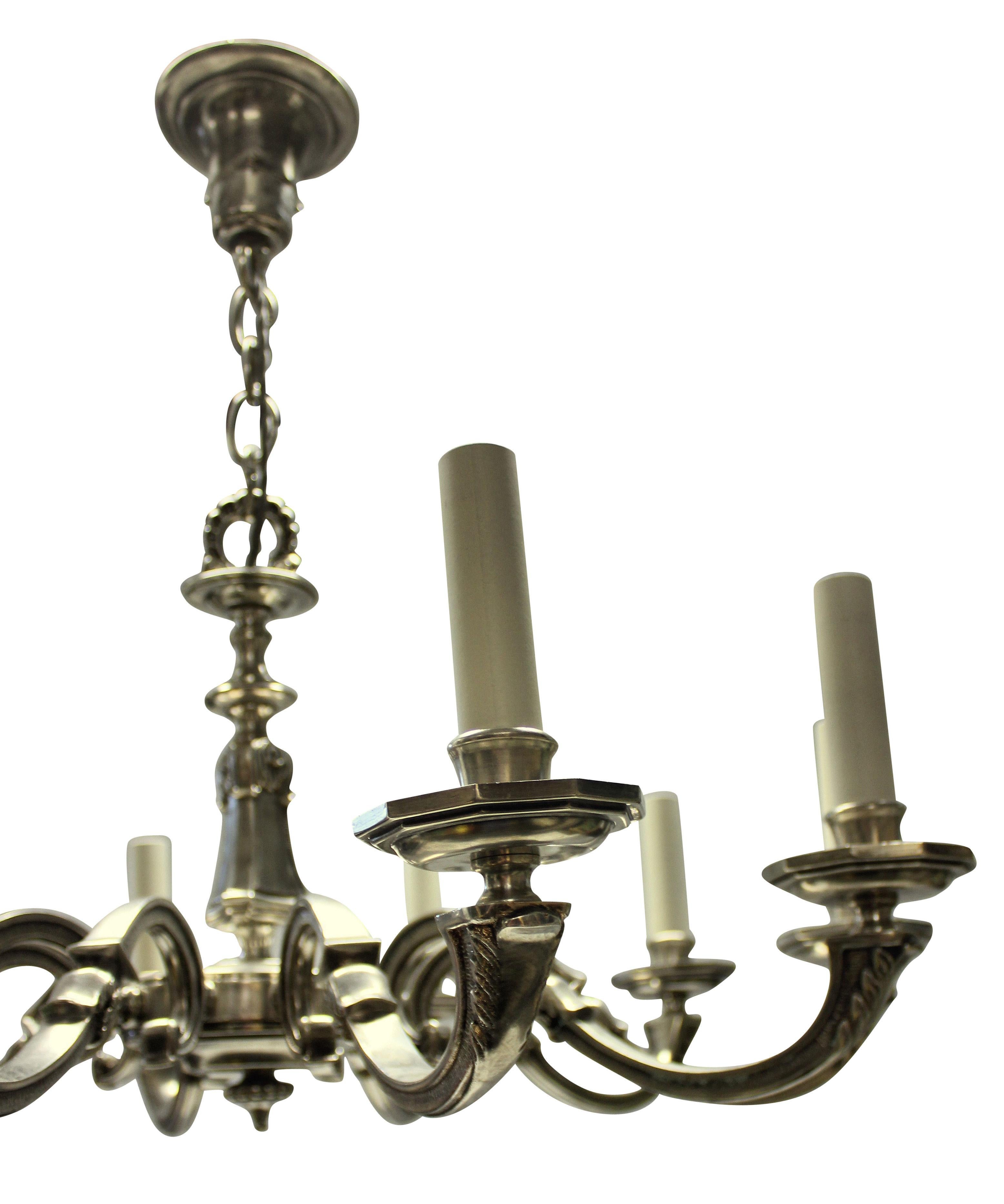 Neoclassical Ten Branch Silver Plated Neo Classical Chandelier For Sale
