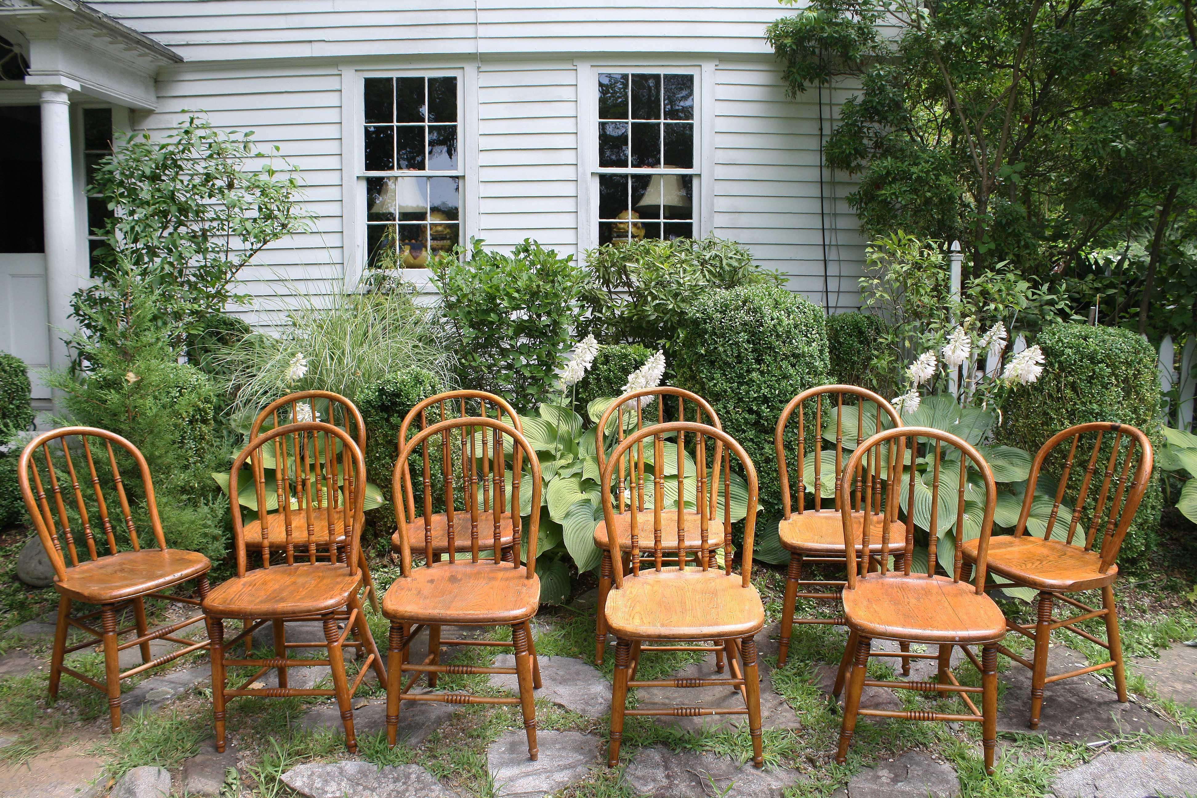 A set of ten 'hoop back' or 'sack back' Windsor side chairs, with pipe stem spindles.  Made in Litchfield County, Connecticut and used by the Swedish Congregational Church; as it was known at the time. The top ring turnings on the spindles of four