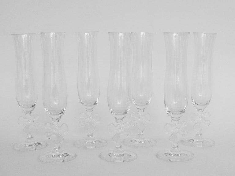 Ten Fun and Fancy Marc Aurel Crystal Champagne Flutes with Puzzle Piece  Stem For Sale at 1stDibs