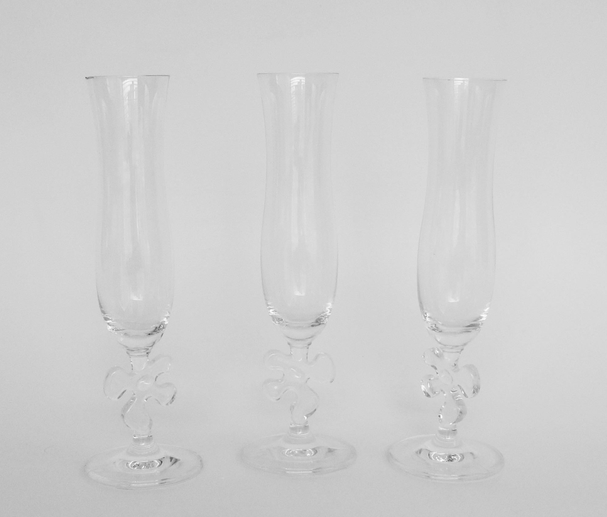 Mid-Century Modern Ten Fun and Fancy Marc Aurel Crystal Champagne Flutes with Puzzle Piece Stem For Sale